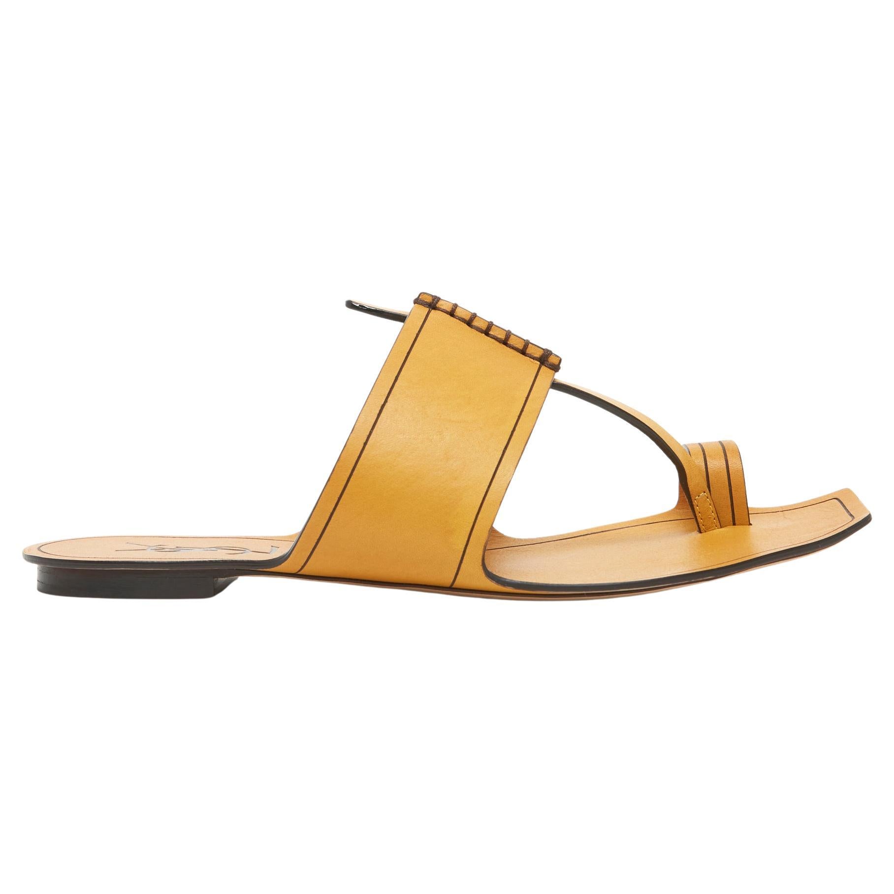 Yves Saint Laurent barefoot sandals, Saba model, in saffron yellow leather, leather interior and exterior soles. Size 37.5FR or US7: insole 24 cm. The sandals are new, delivered in their Saint Laurent box and dustbags, magnificent and... sold out.
