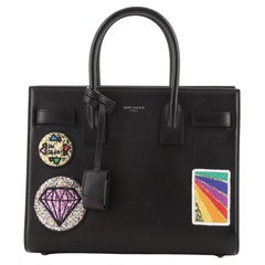Saint Laurent Sac de Jour NM Bag Patch Embellished Leather Baby