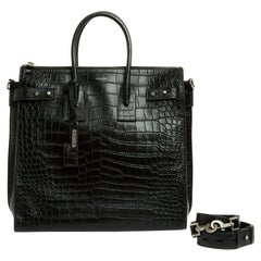 Saint Laurent Sac de Jour Norte/Sur Bolso de piel negra con relieve de cocodrilo Correa