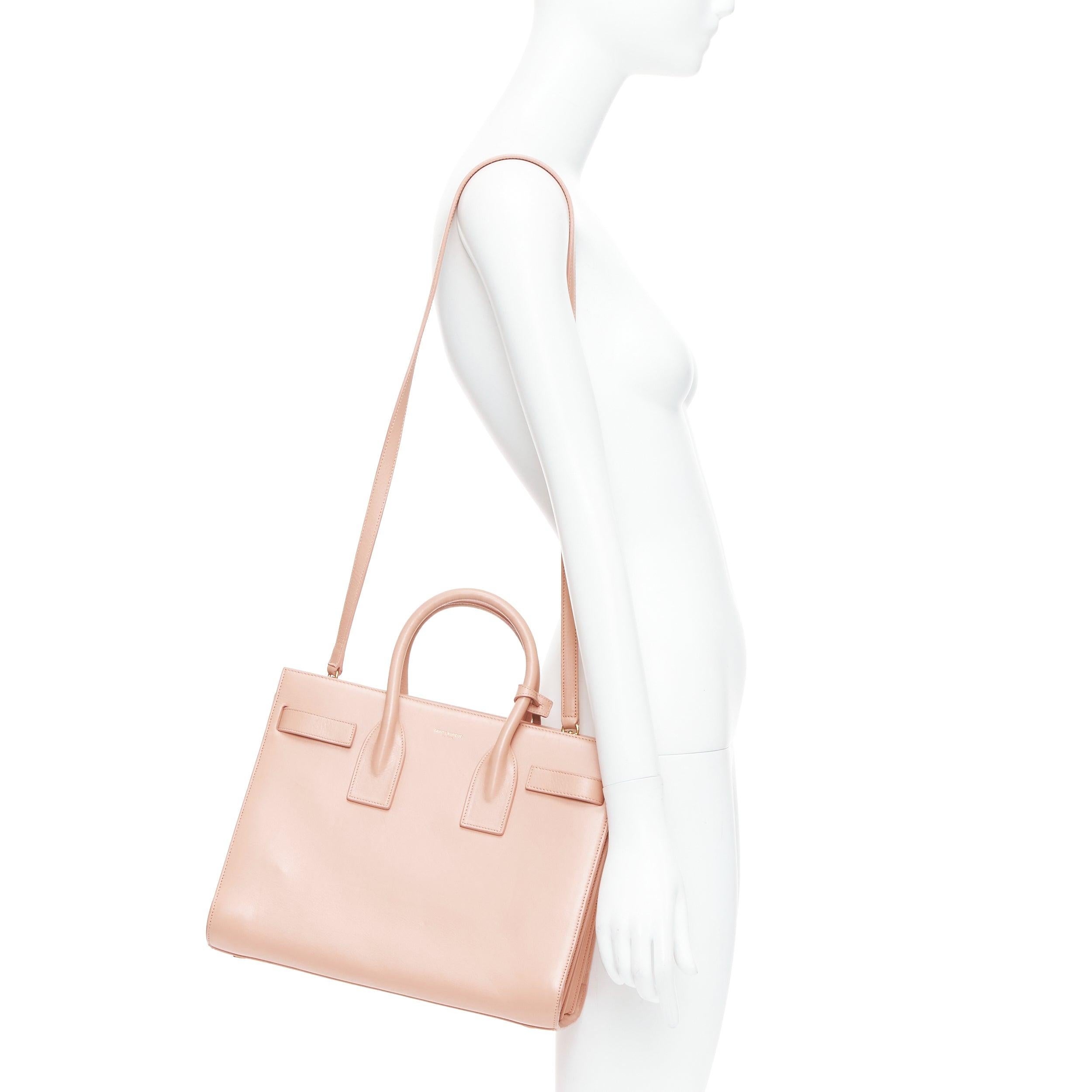 SAINT LAURENT Sac Du Jour pale pink calfskin gold logo executive tote bag
Reference: TGAS/E00478
Brand: Saint Laurent
Model: Sac Du Jour
Material: Leather
Color: Pink
Pattern: Solid
Closure: Zip
Lining: Pink Leather
Extra Details: SAINT LAURENT