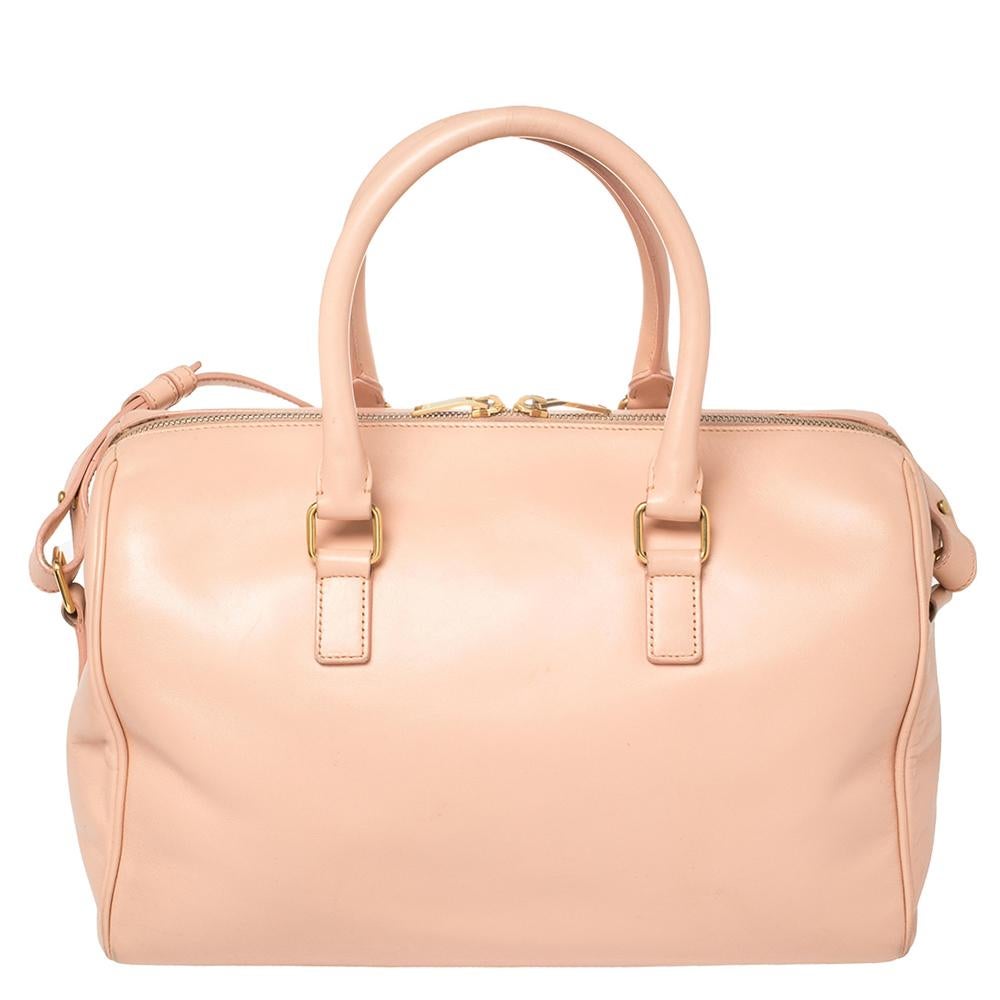Bet it for an easy traveling experience or everyday use, this Classic Duffle 6 from Saint Laurent Paris is perfect! It is crafted from leather and designed with two top handles, a shoulder strap, and a well-sized suede interior.

Includes: Original