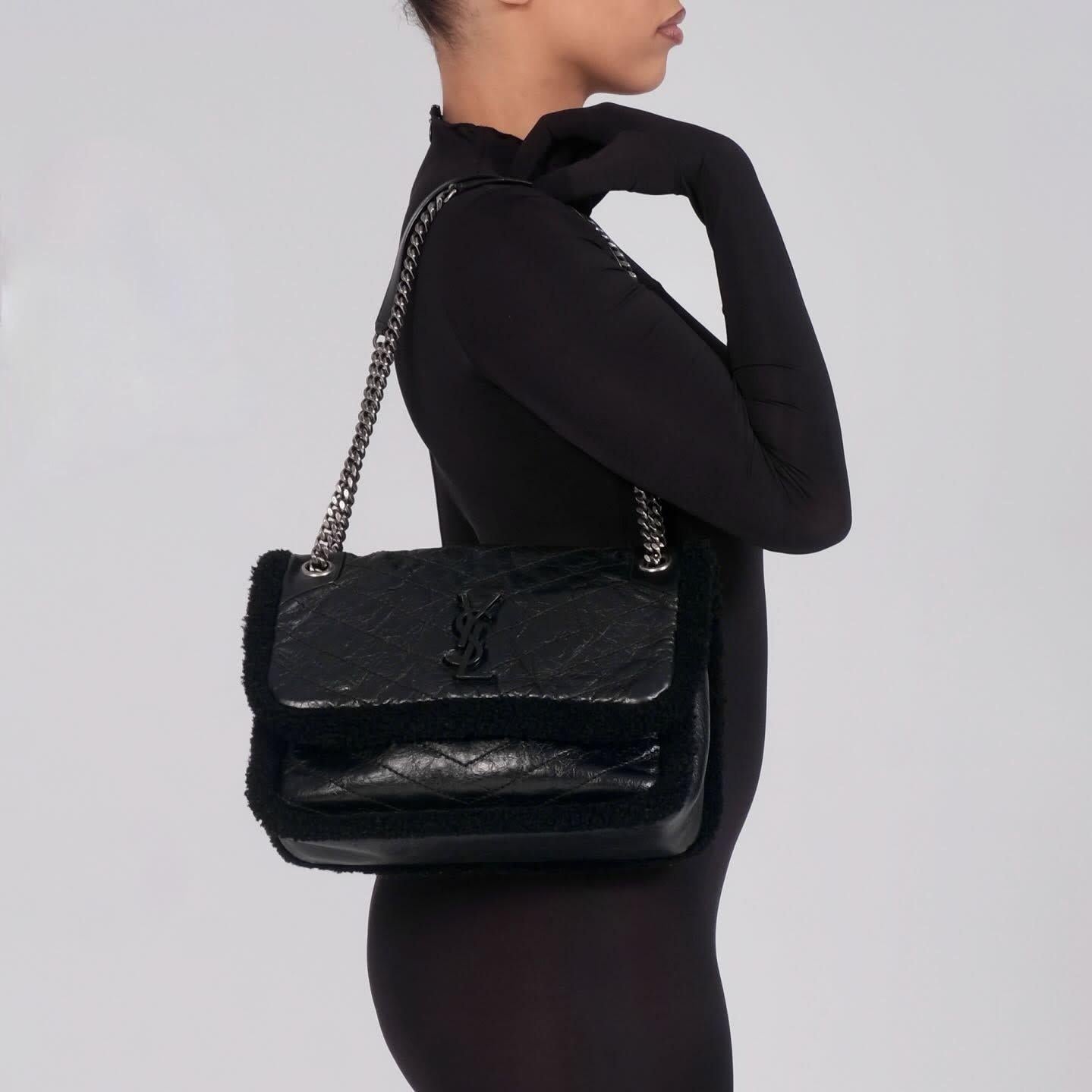 Color: Black
Material: shearing with leather details
Model No. 633187
Comes with: dust bag
Condition: Very good. Bag is pristine.
Made in Italy

Measurements~
Height 8.25”
Width 11.5”
Depth 4”
Drop 10-19”