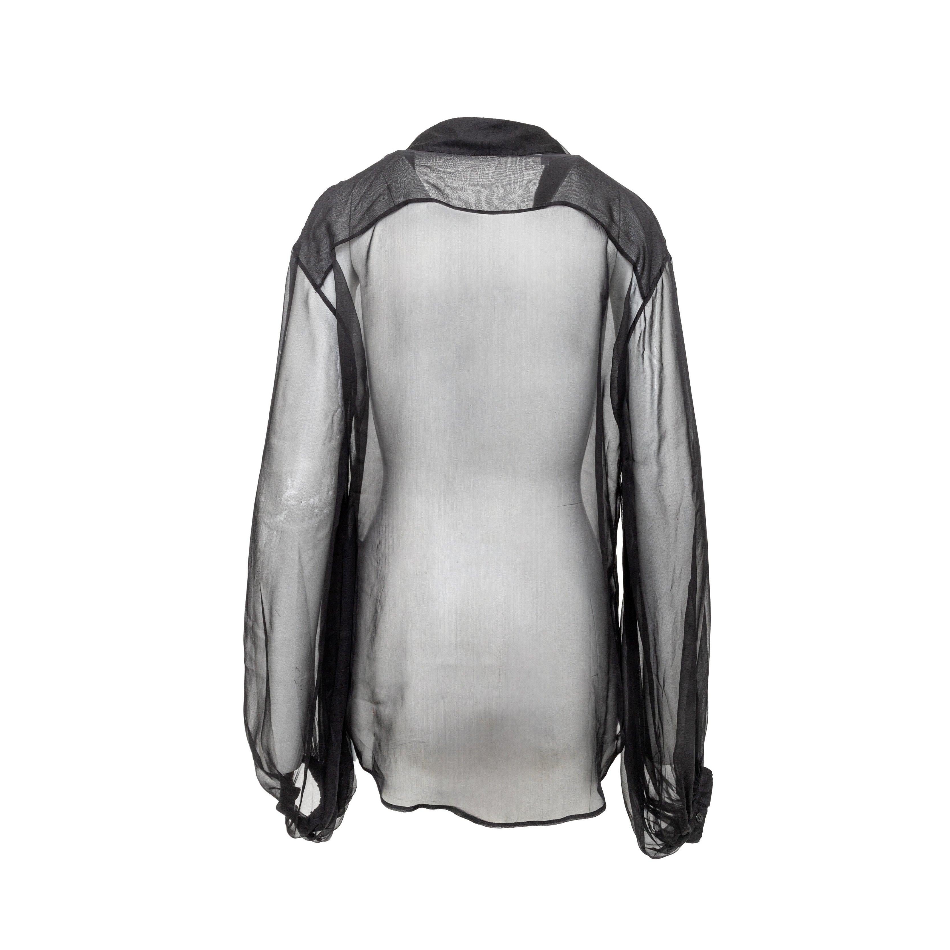 Elevate your wardrobe with this unisex Saint Laurent's sheer shirt. Made of luxurious silk, this classic shirt features semi-sheer fabric and gathered sleeves for a chic touch. Perfect for a sophisticated look with a hint of allure.
Remarks: Minimal