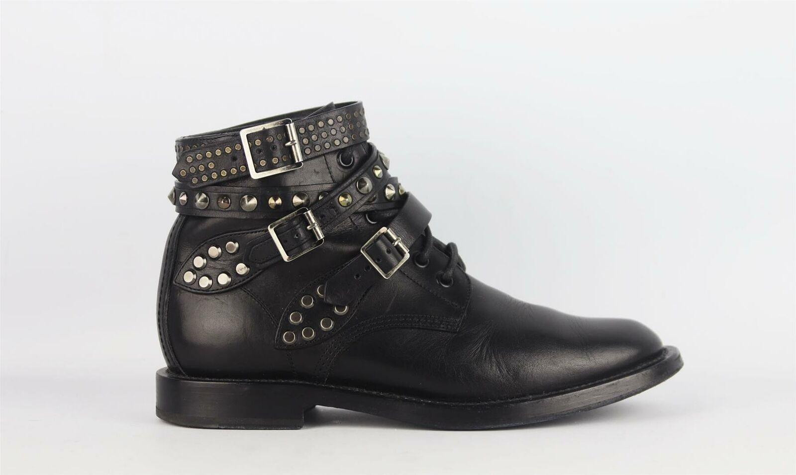 The season's punk looks are all about having a devil-may-care attitude and Saint Laurent's leather boots are full of rebellious spirit, heavily studded and finished with buckled straps, this runway pair is constructed with a durable heel and
