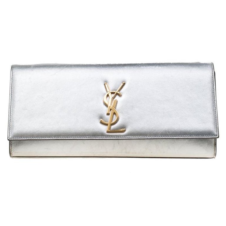 Saint Laurent Silver Leather Monogram Cassandre Clutch For Sale at 1stDibs