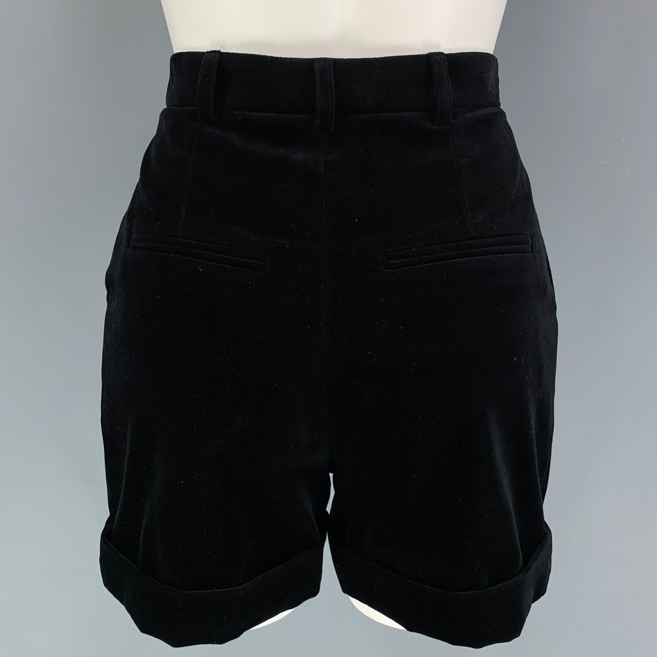 SAINT LAURENT shorts comes in black cotton featuring a high waist, pleated, cuffed, front tab, and a zip fly closure. Made in Italy.
Excellent
Pre-Owned Condition. 

Marked:   F 34 

Measurements: 
  Waist: 24 inches  Rise: 12 inches  Inseam: 4.5