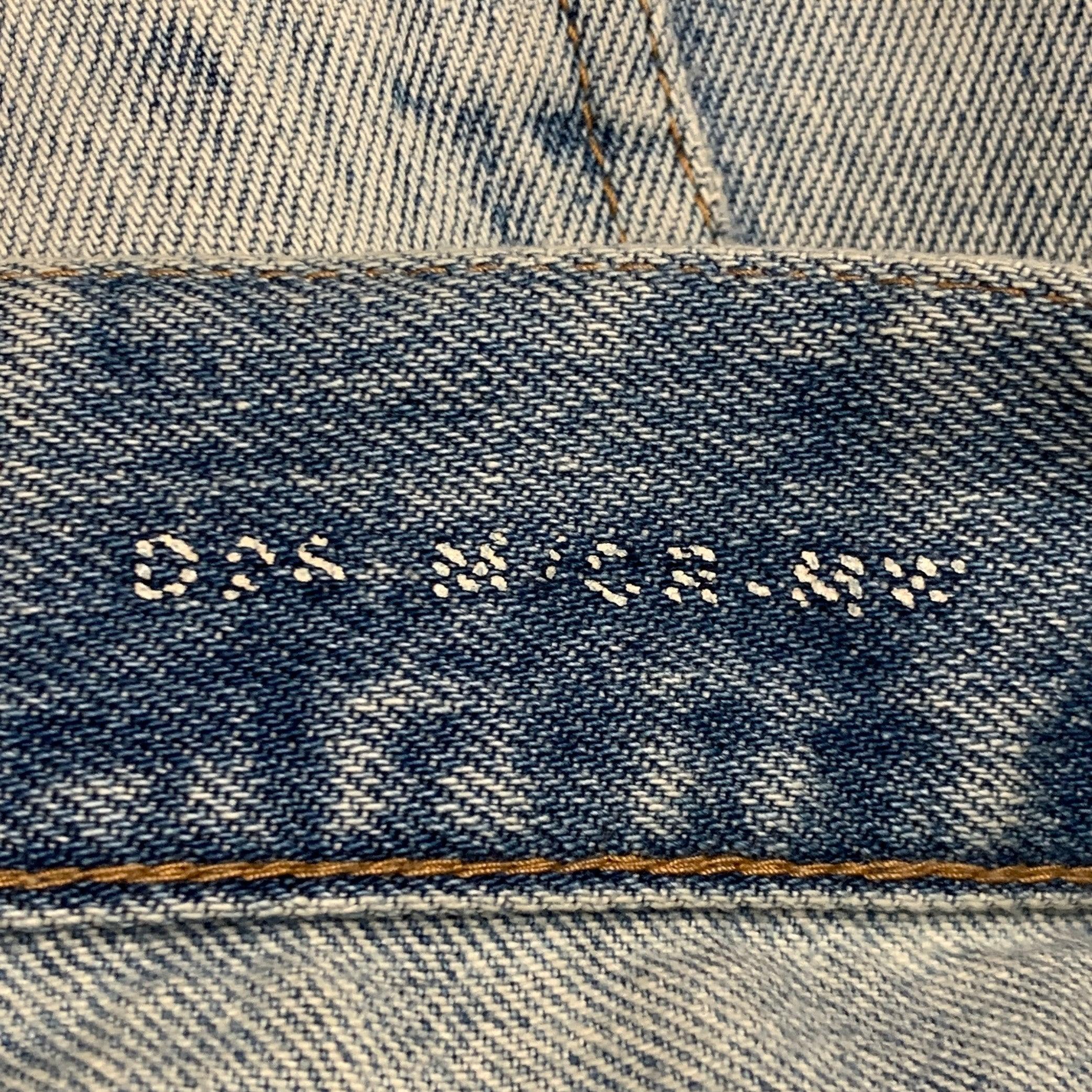 SAINT LAURENT Taille 31 Bleu Distressed Cotton Tapered Zip Fly Jeans en vente 1