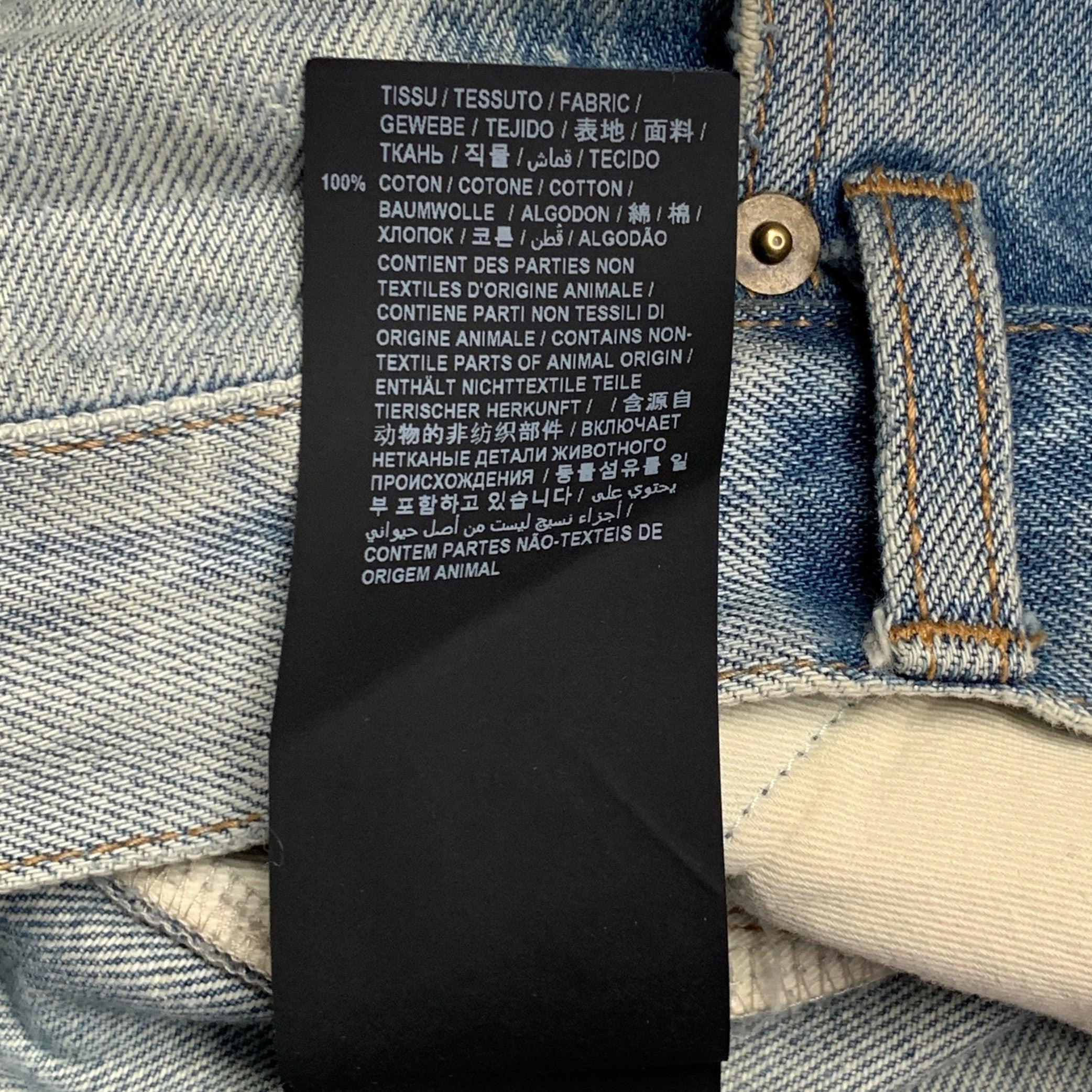 SAINT LAURENT Taille 31 Bleu Distressed Cotton Tapered Zip Fly Jeans en vente 3