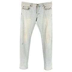 Saint Laurent Taglia 33 Jeans blu chiaro in cotone ed elastan con chiusura a bottone