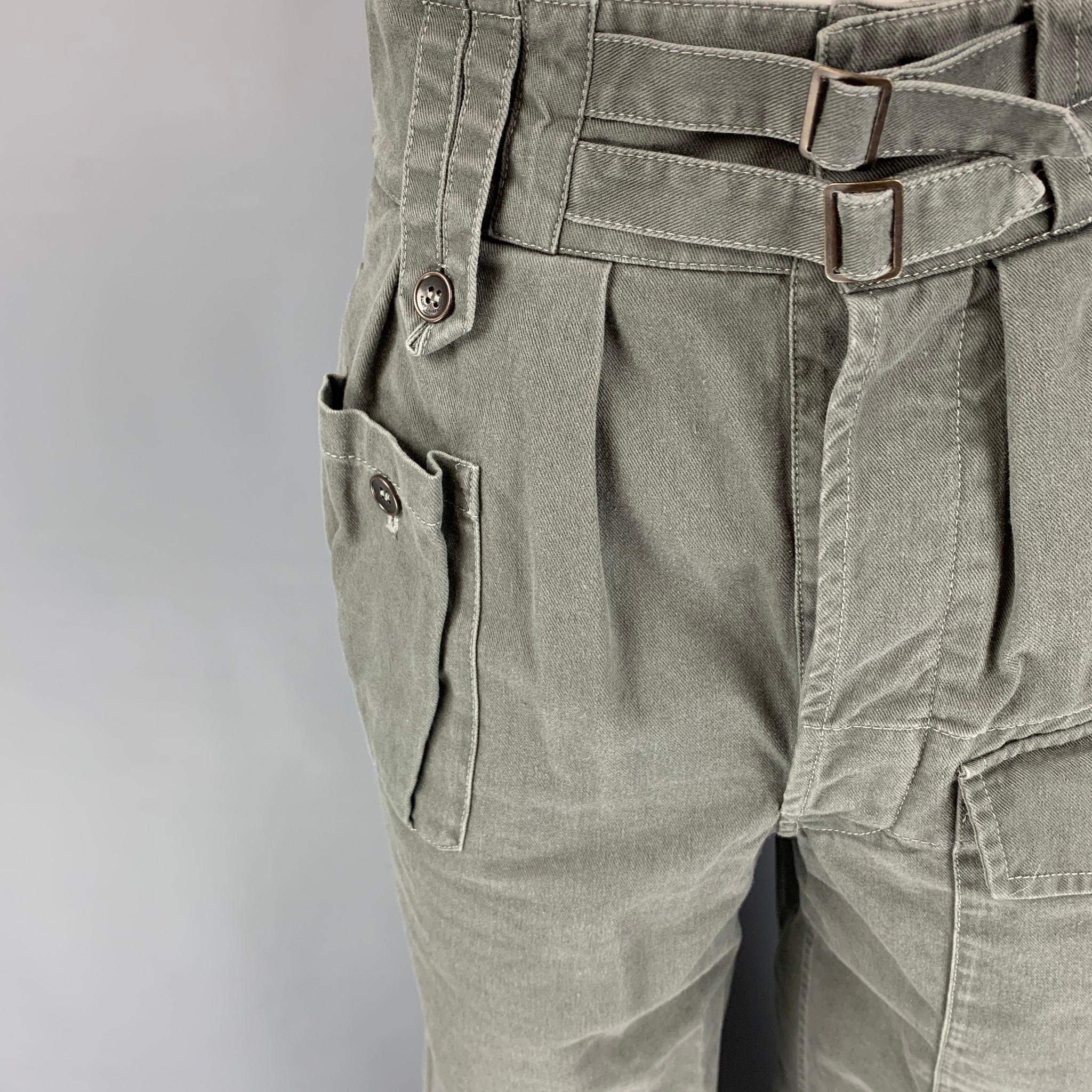SAINT LAURENT 2019 casual pants comes in a olive twill cotton / ramie featuring a cropped style, front pockets, cuffed leg, contrast stitching, and a button fly closure. Made in Italy. 

Very Good Pre-Owned Condition.
Marked: F