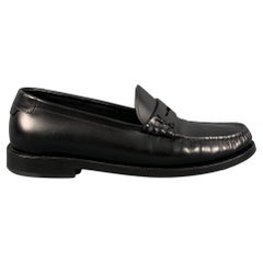 SAINT LAURENT Penny Loafers aus schwarzem Leder mit Monogramm, Größe 7