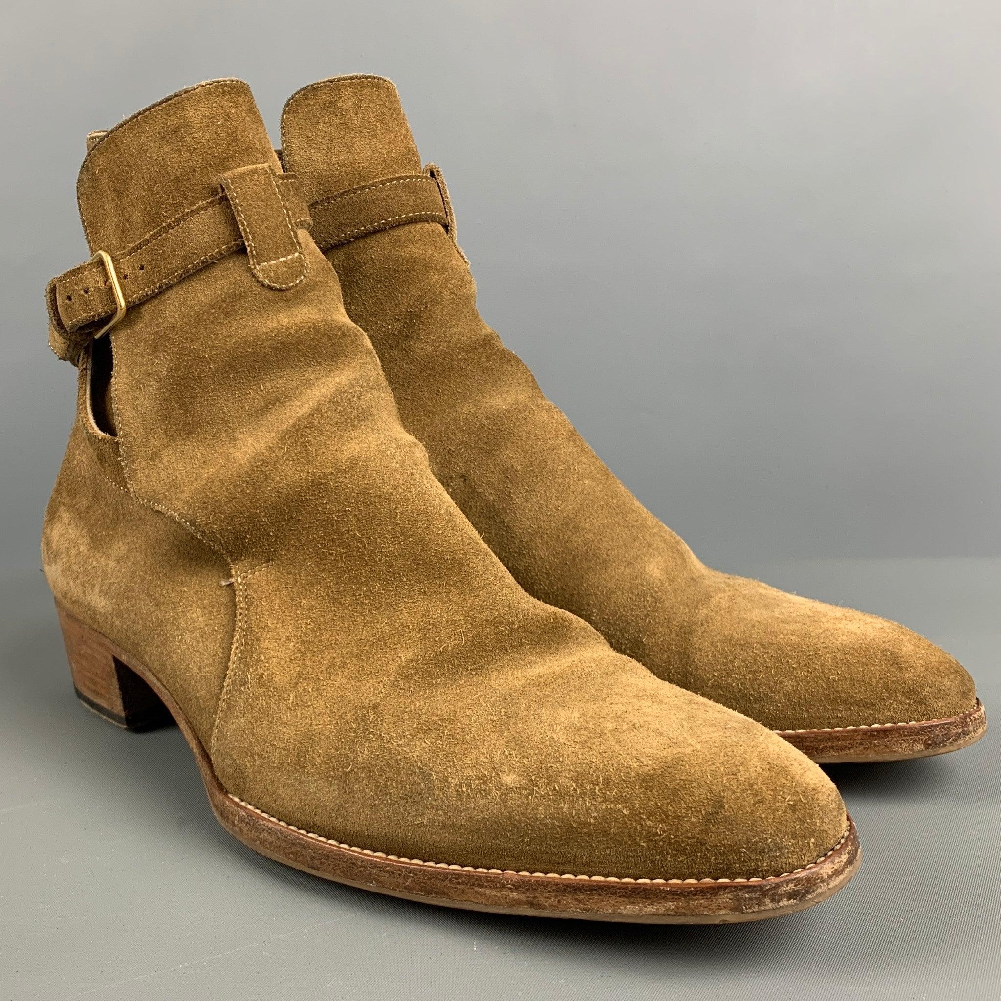 SAINT LAURENT WYATT JODHPUR boots in a tan suede featuring pointed toe, ankle style, and a wrap around strap. Comes with box. Made in Italy.Very Good Pre-Owned Condition. Moderate signs of wear. 

Marked:   IT 40 

Measurements: 
  Length: 10 inches