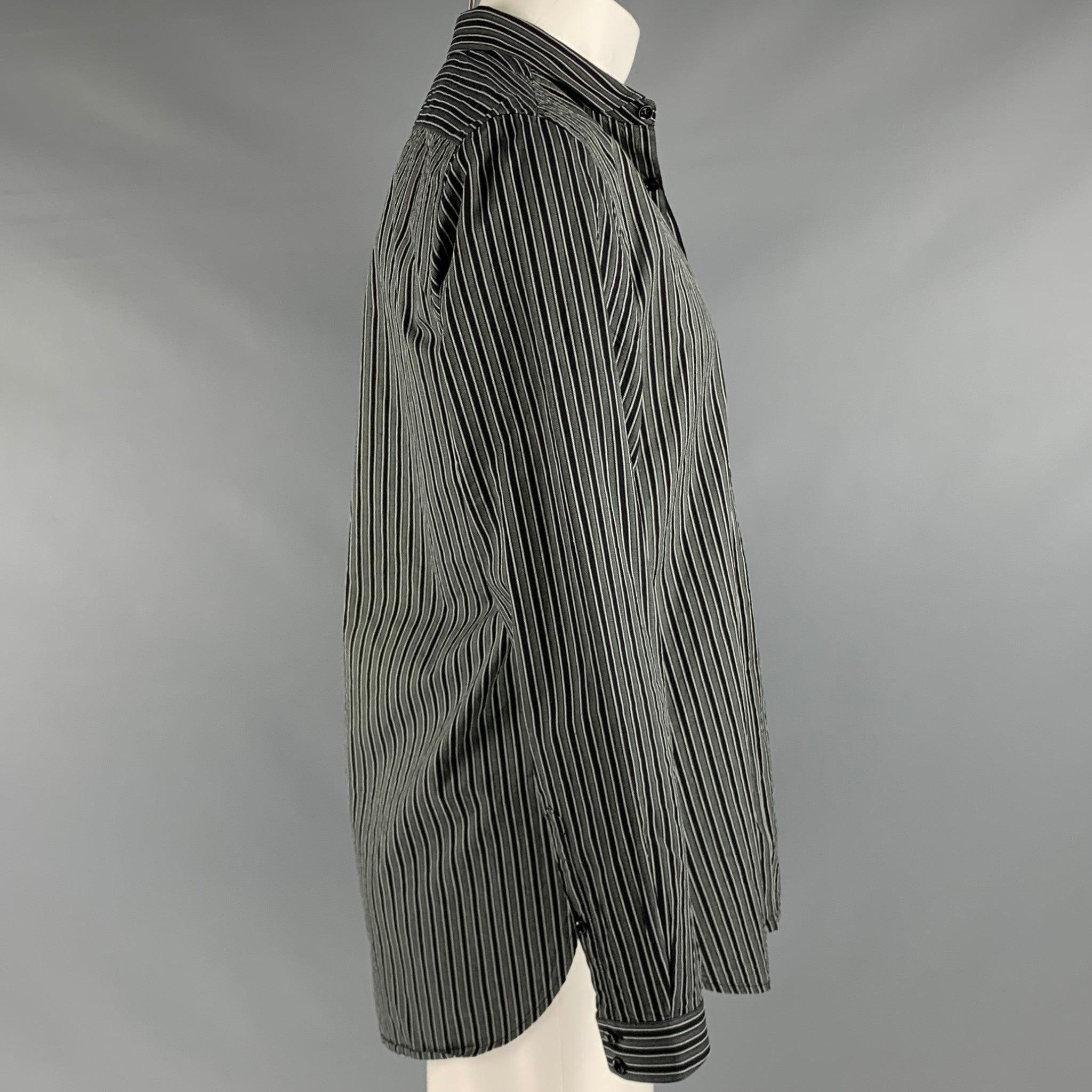 SAINT LAURENT long sleeve shirt
in black and grey cotton fabric featuring vertical stripe pattern, cutaway collar, and button closure. Made in Italy. Very Good Pre-Owned Condition. Minor pilling. 

Marked:   40/15.75  

Measurements: 
  
Shoulder: