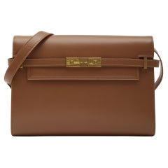 Saint Laurent Borsa a tracolla media Manhattan in pelle di vitello liscia Cognac