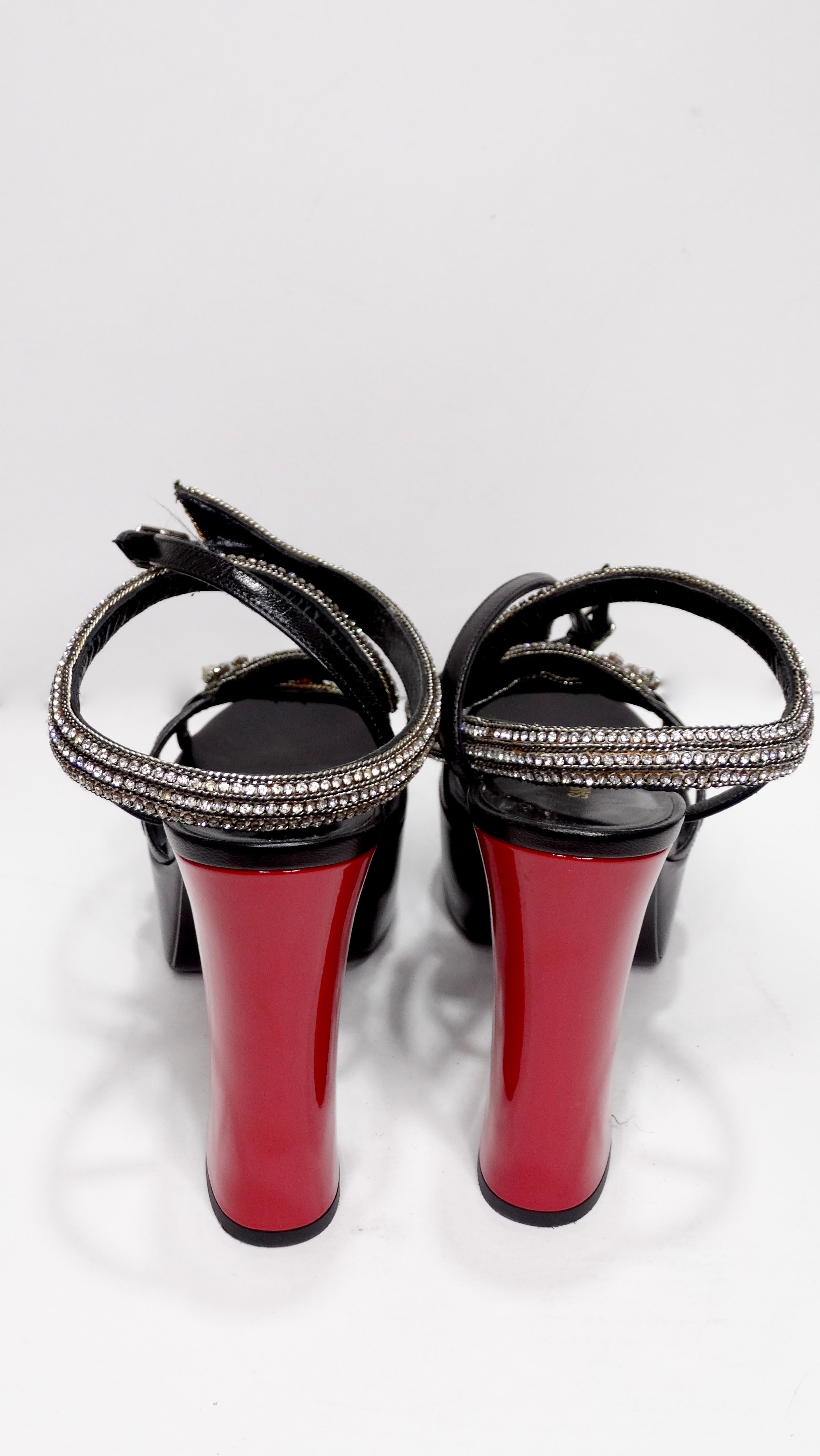 snake embellished heels