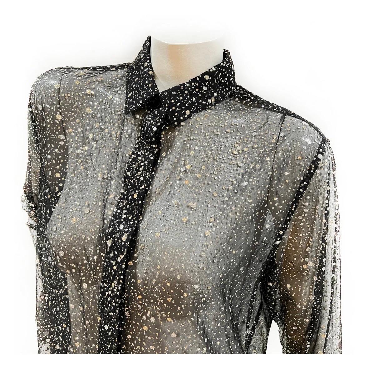 Sparkle Button Down Blouse by Saint Laurent
Spring / Summer 2017
Made in Italy
Black/silver/gold 
Sheer fabric detail
Gold and silver glitter detail throughout top
Invisible front button closure
Cuffs have button closure
Collar neckline detail
Long