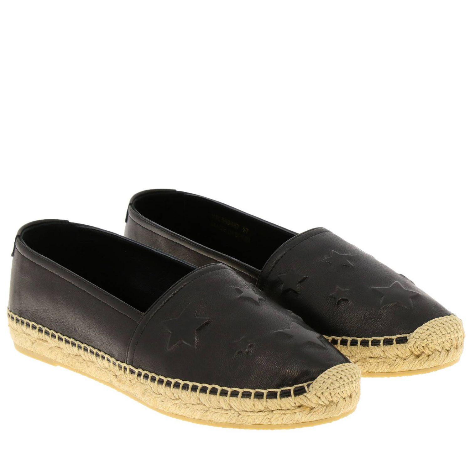 Saint Laurent Star Embossed Black Leather Espadrille

These Saint Laurent black leather espadrilles feature an almond toe, braided raffia rubber sole, and a slip-on style. Brand new. Made in Spain.

Size: 36.5