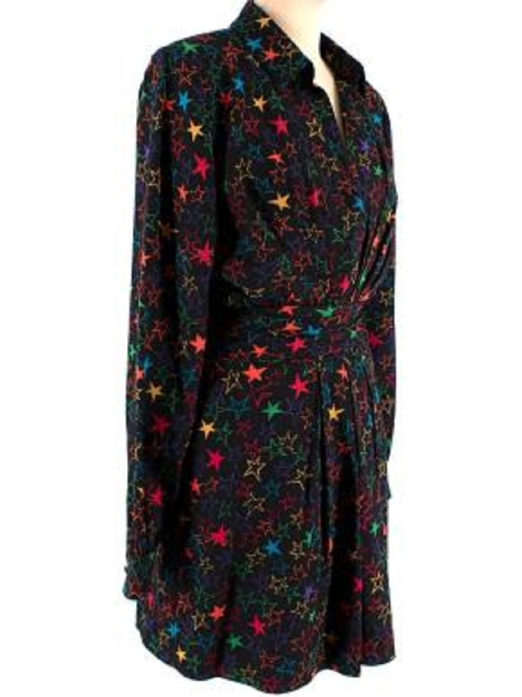 Saint Laurent Star Pattern Pleated Mini Shirt Dress

- V neckline
- Long sleeved
- Collared neckline
- Concealed zip fastening
- Buttoned cuffs
- Concealed pockets
- Pleated skirt
- Padded shoulders

Material
100% Viscose
Lining: 100% Silk

Dry
