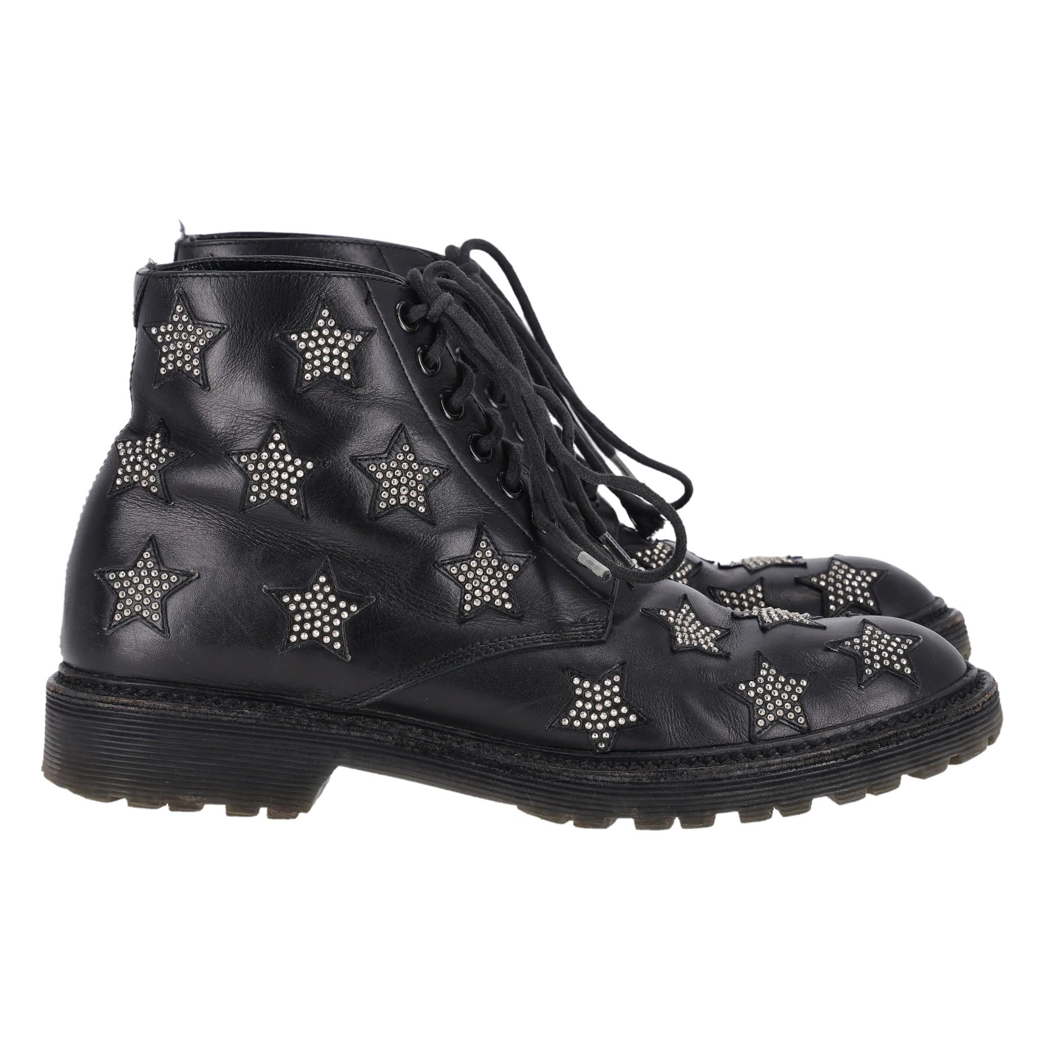 Saint Laurent Star Studded Leather Combat Boots In Good Condition In London, GB