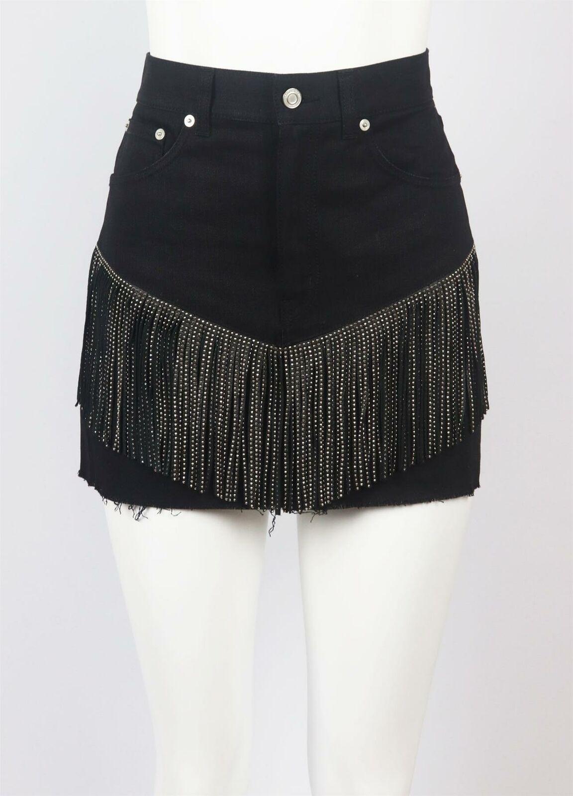 Saint Laurent's black denim mini skirt has a western-inspired feel, it's designed with studded leather fringing and has raw hems that create a cool, undone look.
Black denim, black leather.
Concealed zip and button fastening at front.
98% cotton, 2%