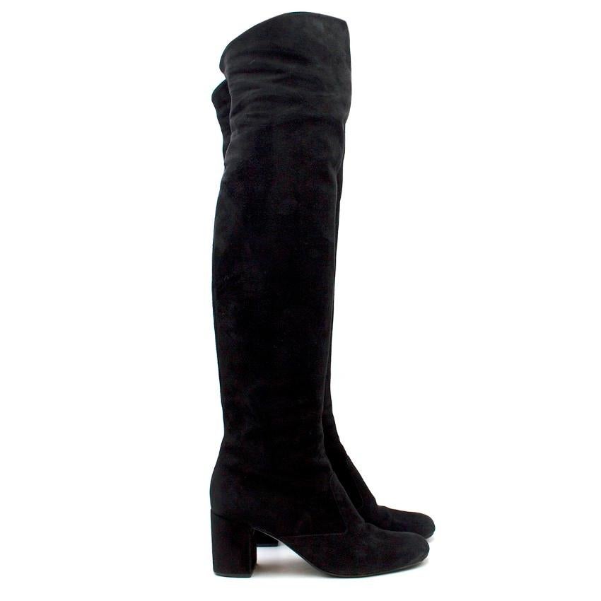 Saint Laurent Suede Long Heeled Boots

- Black suede
- Over knee length
- Closed round toe
- Suede block heel
- Inner zip fastening
- Comes with dust bag

Please note, these items are pre-owned and may show some signs of storage, even when unworn