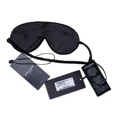 Saint Laurent, suede sleeping mask with studs