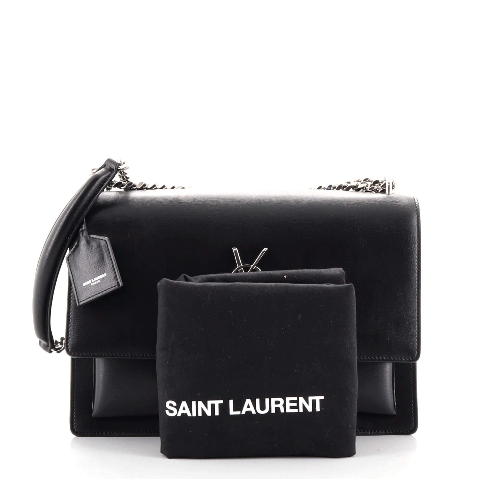 Condition: Very good. Odor in interior. Light scuffs and wear on exterior, moderate wear and marks underneath flap and in interior, scratches on hardware.
Accessories: Clochette, Dust Bag
Measurements:
Designer: Saint Laurent
Model: Sunset Crossbody