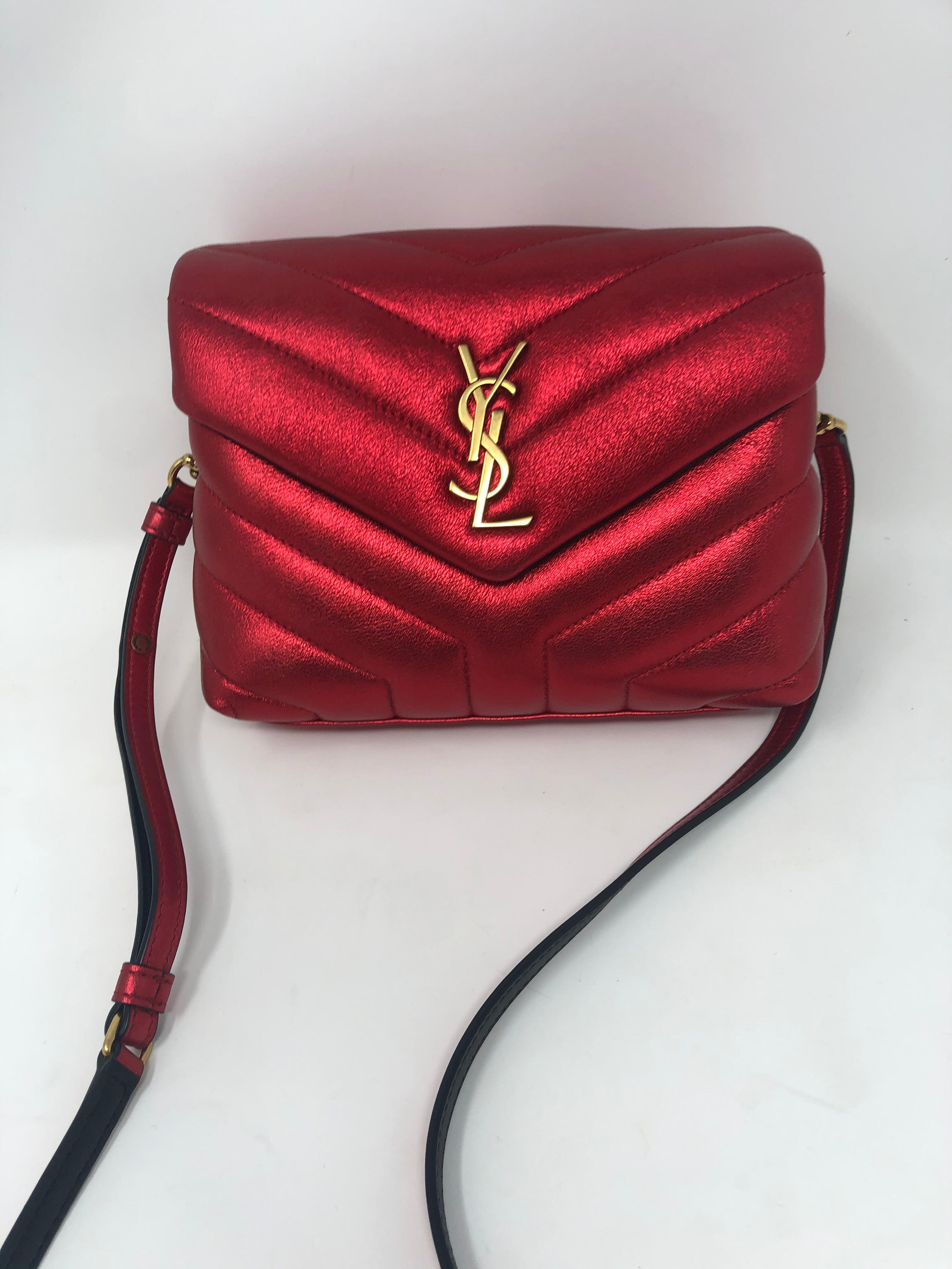 Saint Laurent Red Toy Loulou Matelasse Crossbody Bag. Retail $1650. Bag is brand new with tag. This is a more compact version of the Loulou bag. This bag can be worn as a crossbody or as a clutch. Bag has never been used. Guaranteed authentic. 
