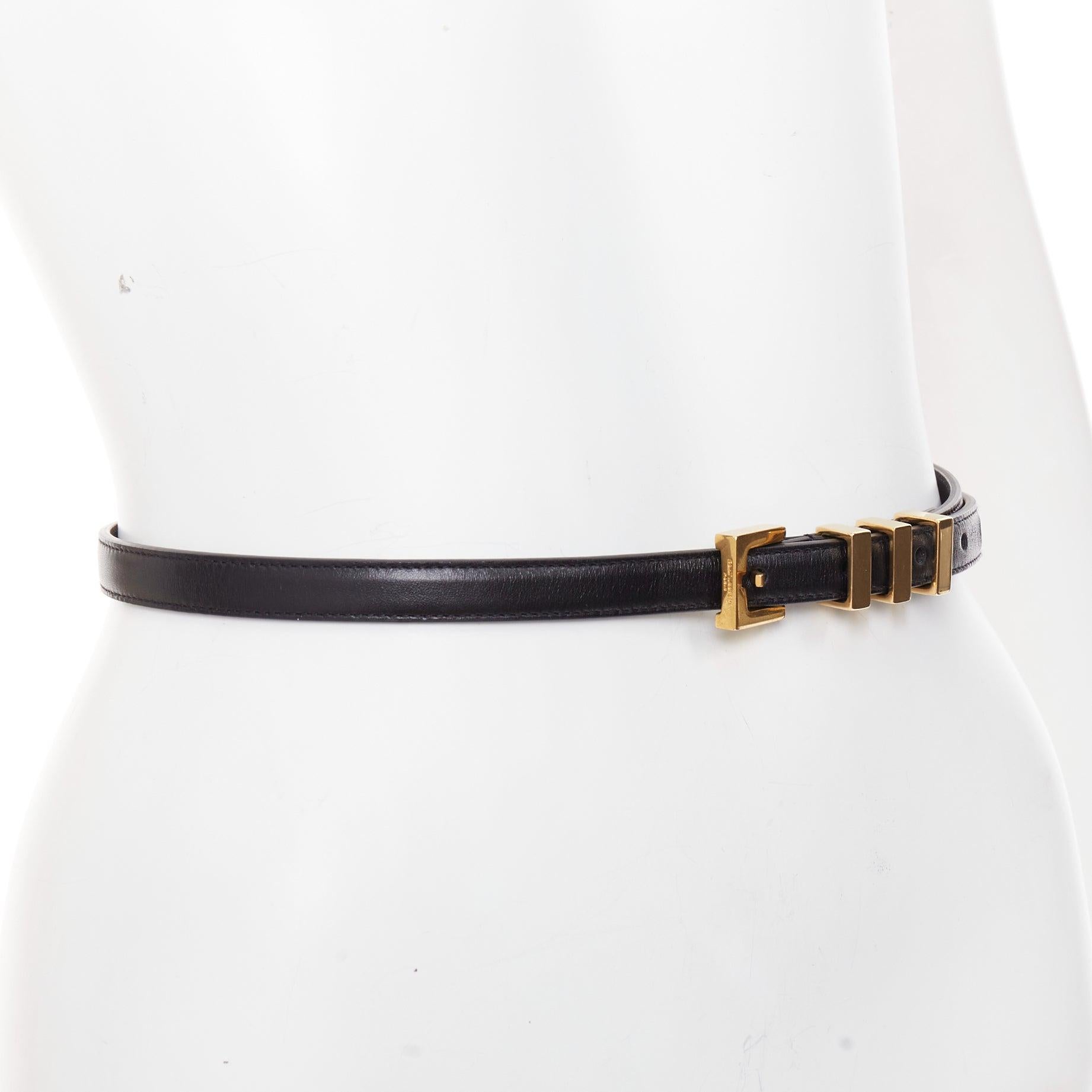 Nero Saint Laurent Trois Passants cintura skinny in pelle nera con fibbia a 3 passanti in oro in vendita