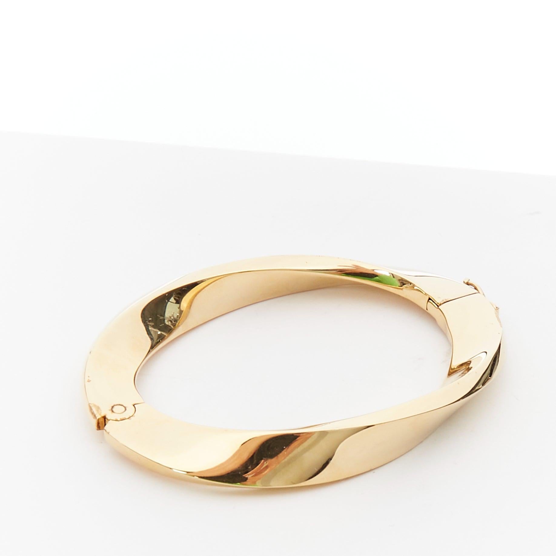 Women's SAINT LAURENT Twisted gold double push clasps hard bangle For Sale