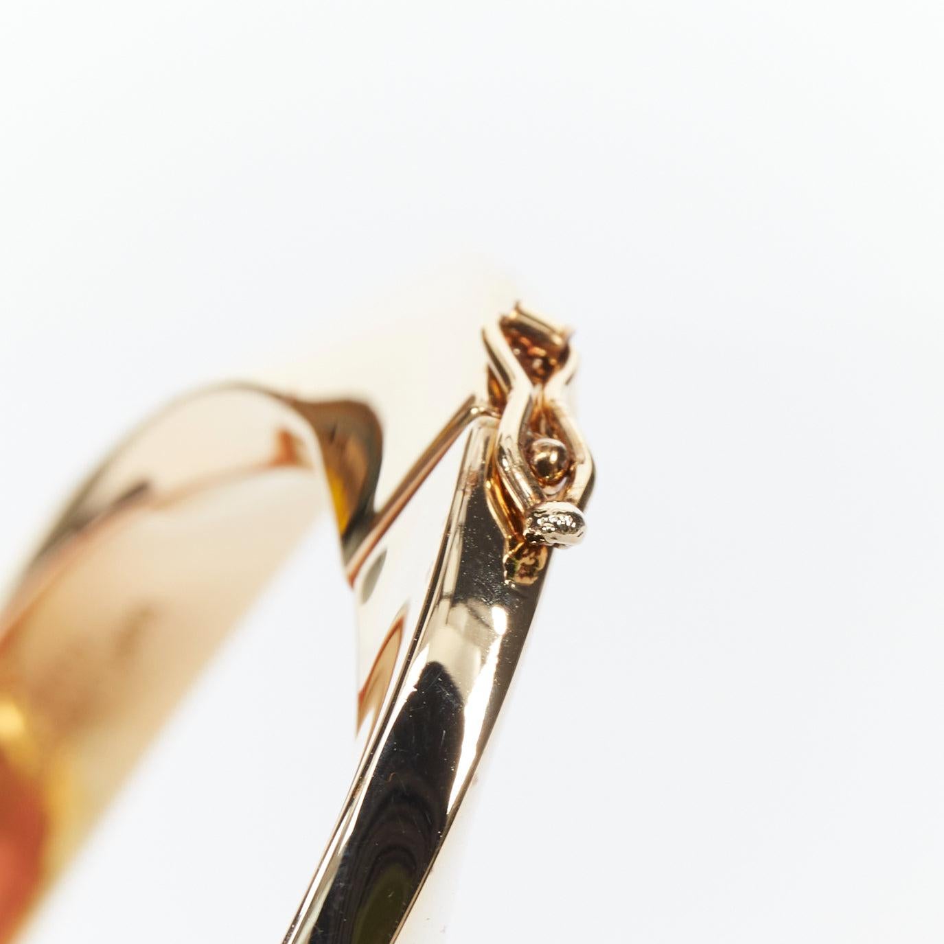 SAINT LAURENT Twisted gold double push clasps hard bangle For Sale 3