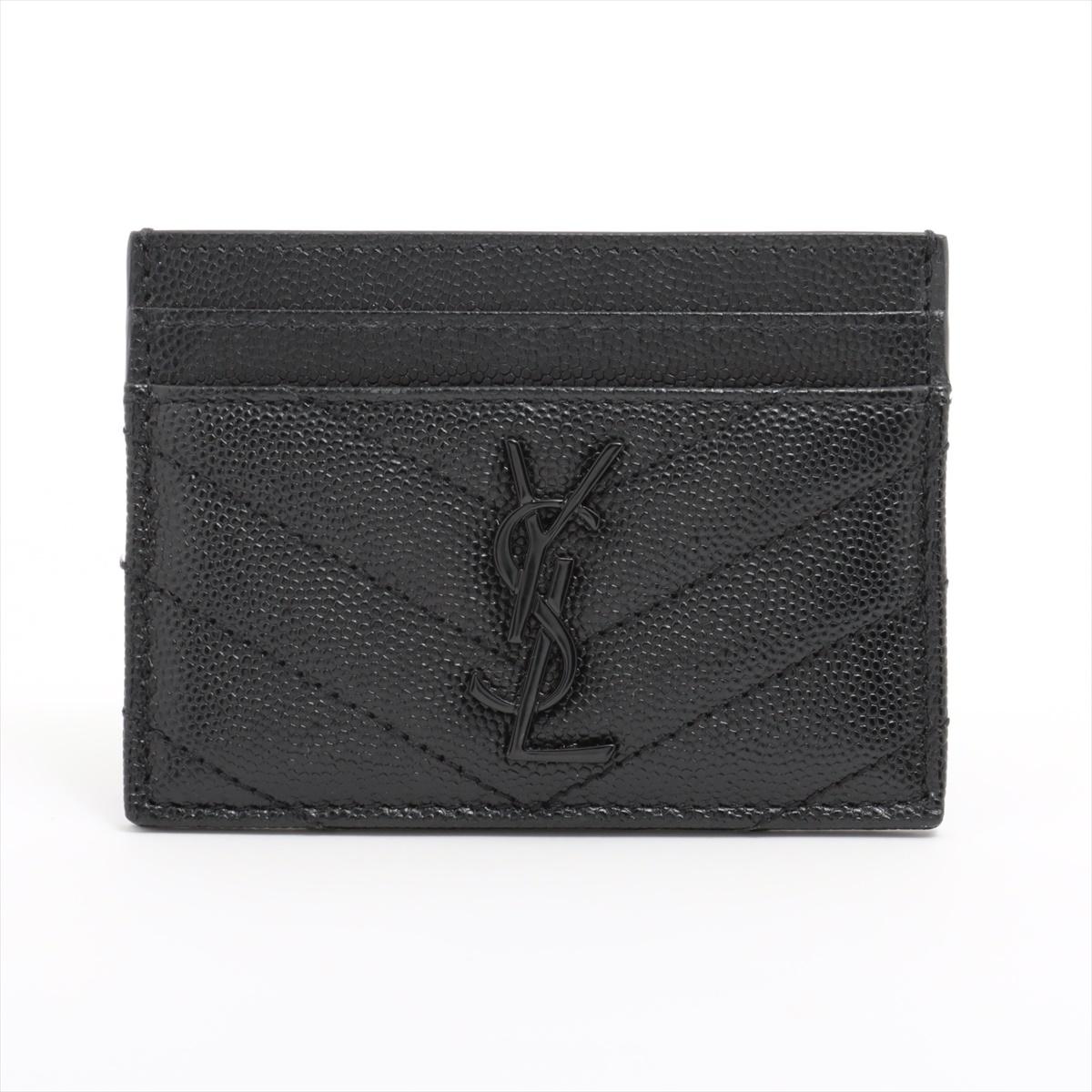 The Saint Laurent V Stitch Leather Card Case in Black is a sleek and sophisticated accessory that exemplifies the brand's minimalist yet luxurious design. Crafted from smooth leather, the card case features a distinctive V-shaped stitch detail on