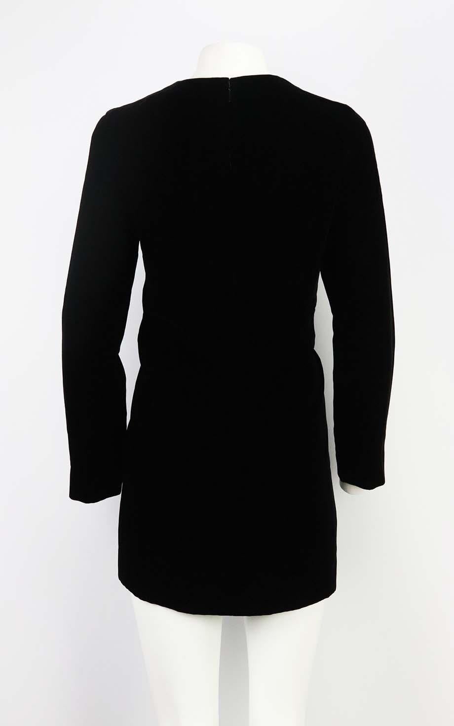 This mini dress by Saint Laurent has an alluring notched neckline and puffed sleeves that add definition to the slim silhouette. Black velvet. Zip fastening at back. 85% Viscose, 15% cupro; lining: 100% silk. Size: FR 42 (UK 14, US 10, IT 46). Bust