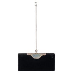 Saint Laurent Vintage, la pochette con tracolla a catena in velluto nero