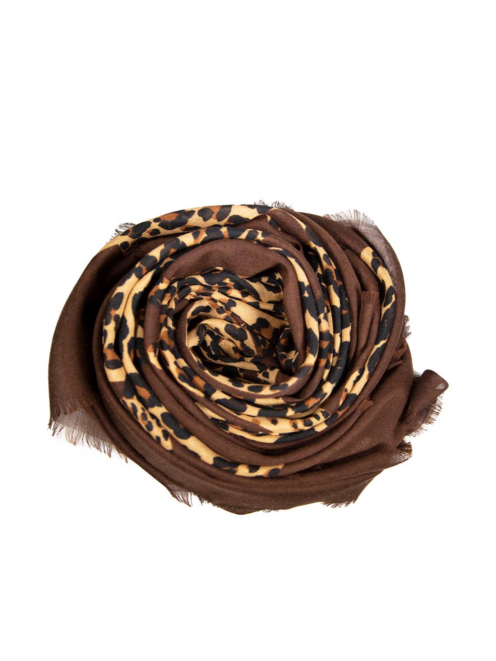 CONDITION is Very good. Minimal wear to scarf is evident. Minimal wear to the top-left with a small hole to the weave on this used Yves Saint Laurent designer resale item.
 
 Details
 Vintage
 Brown
 Wool
 Square scarf
 Leopard print pattern
 Frayed