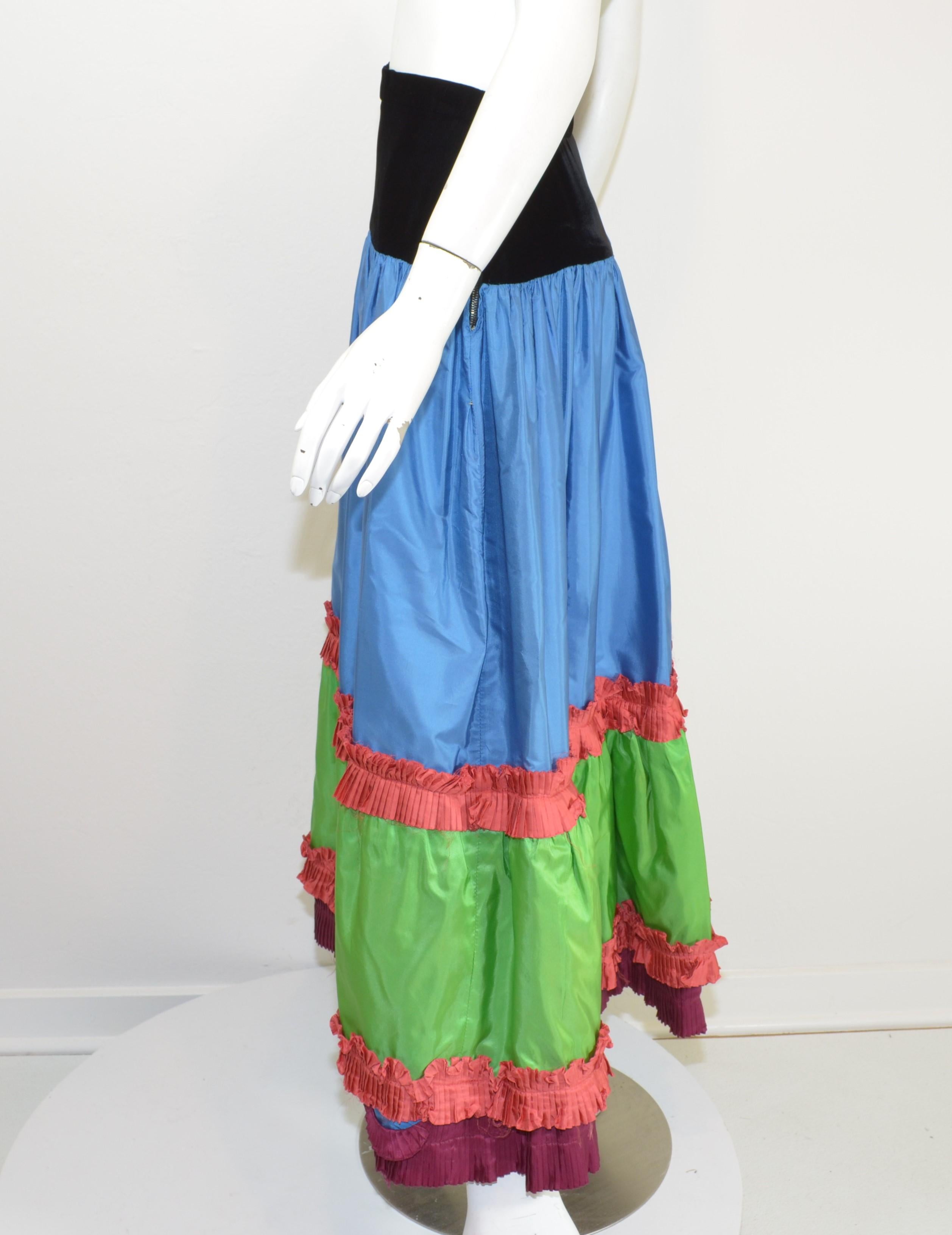 Saint Laurent Vintage Taffeta Skirt with Velvet — Featured in vibrant multicolored taffeta fabric with a velvet panel around the waist and has a zipper and hook fastening. Skirt is in excellent vintage condition with minimal wears. See photos. Made