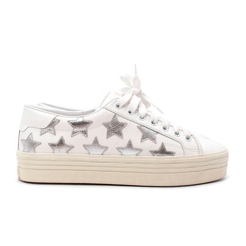 Saint Laurent White California Court Silver Star Leather Sneakers

- Signature court-inspired sneaker by Saint Laurent featuring a thick platform rubber sole and all-white leather body decorated with metallic silver stars
- Tonal white elasticated