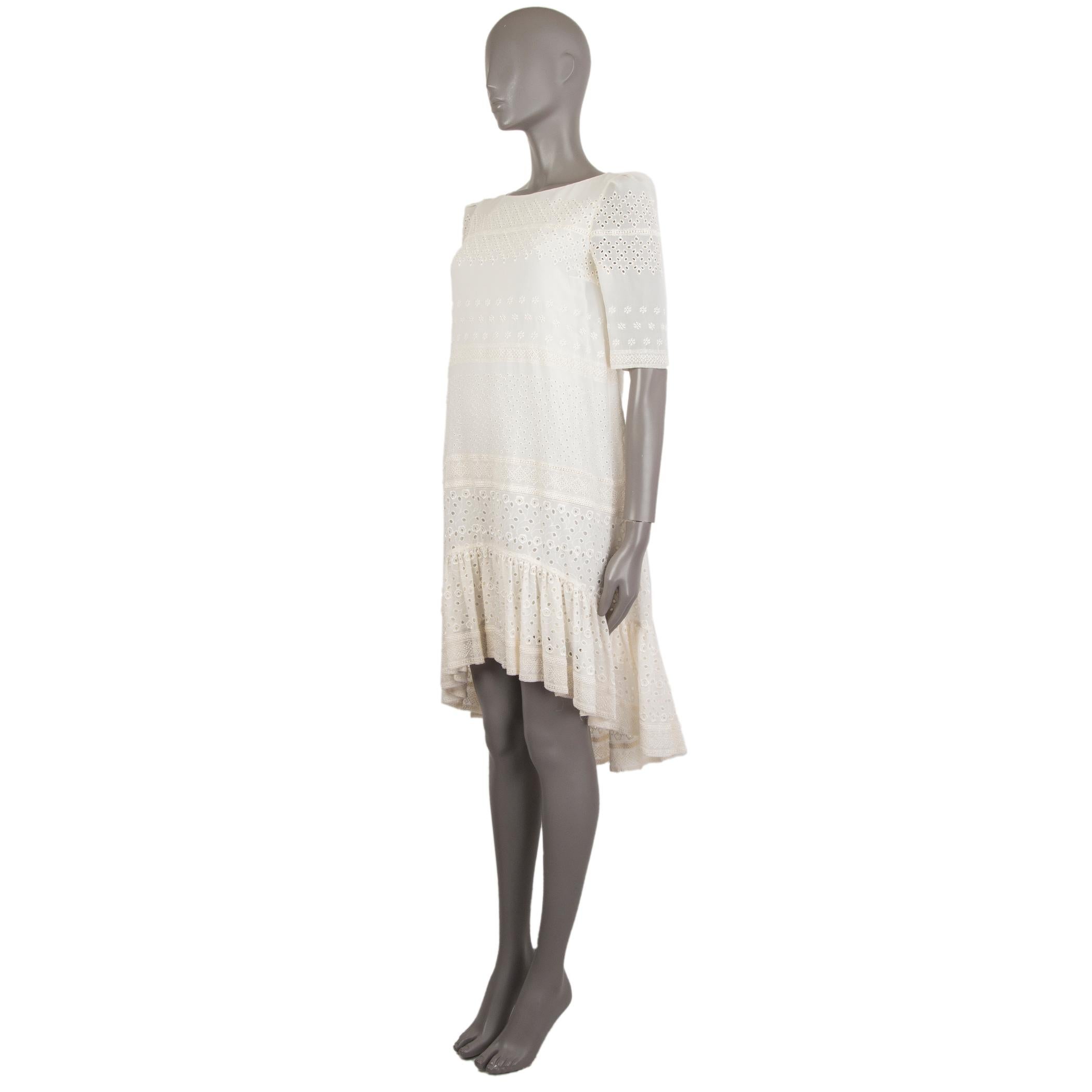 Saint Laurent 3/4-sleeve ebroidered-lace shift dress in off-white silk (48%), viscose (42%), and cotton (10%). With round neck and ruffled hemline. Lined in off-white silk (100%). Has been worn and is in excellent condition. 

Tag Size 36
Size