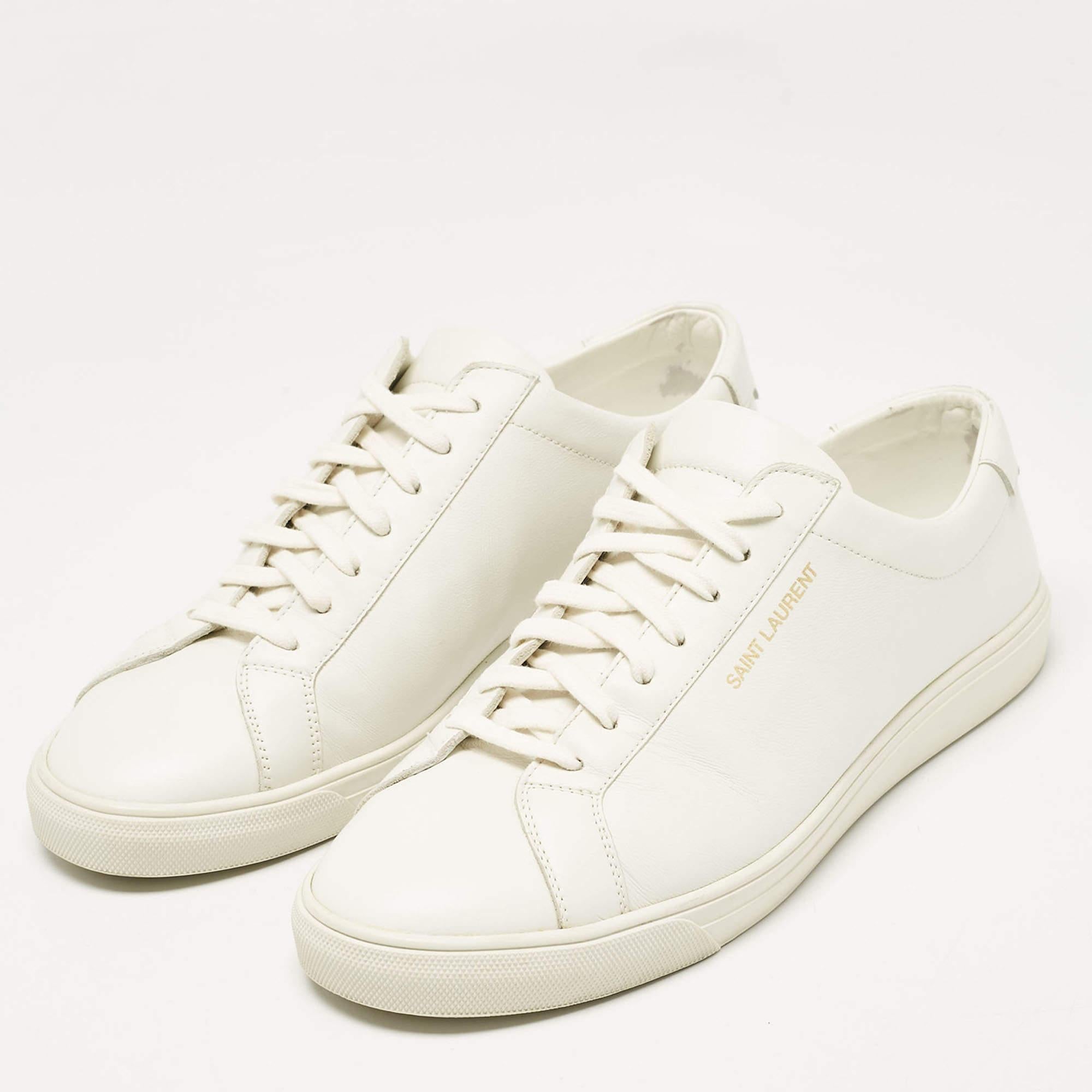 Style these Saint Laurent Andy sneakers with any outfit for a luxurious feel and look. Designed in premium white leather this stylish low top pair features a lace up closure and a Saint Laurent logo on the side.