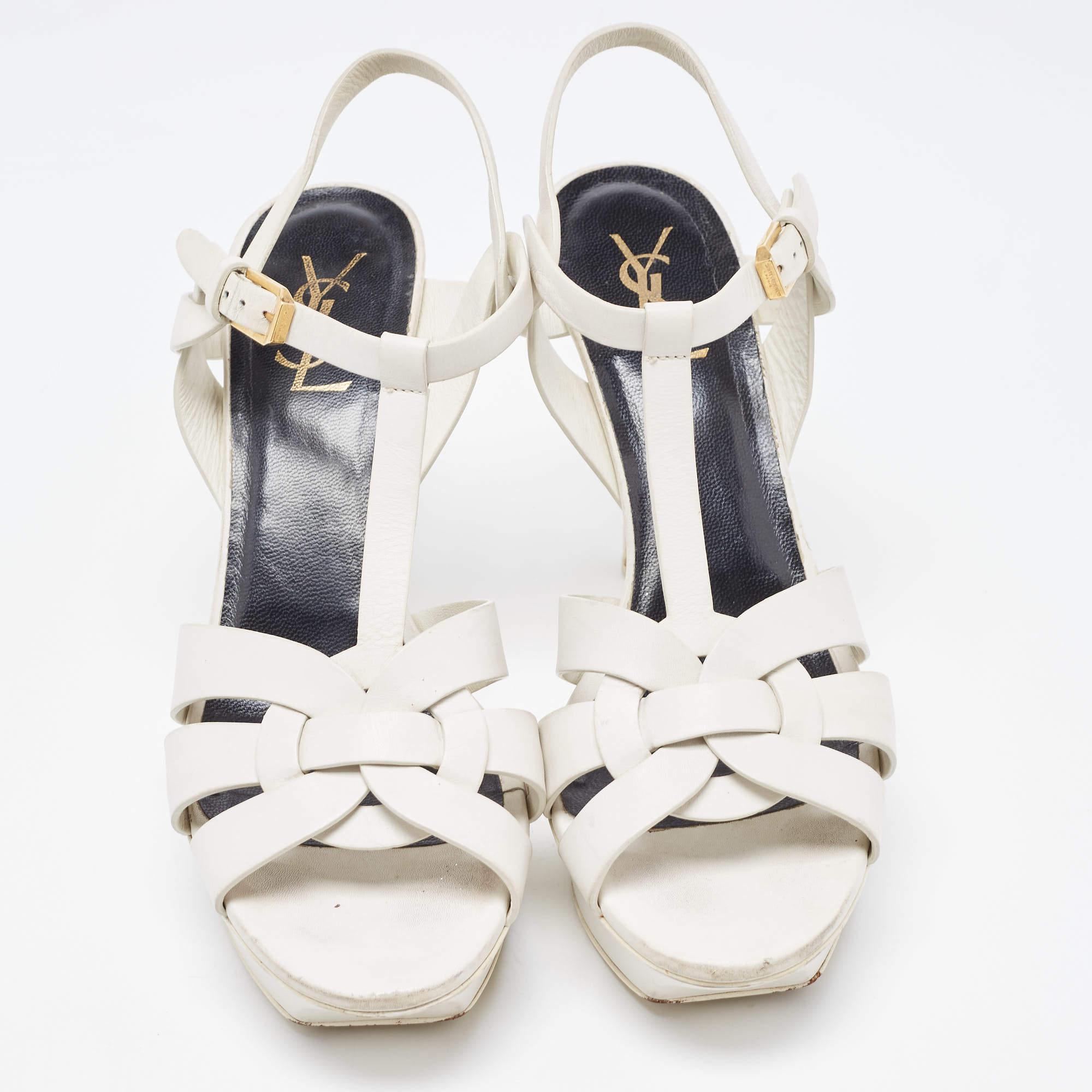 One of the most celebrated designs from Saint Laurent is their Tribute sandals. They are preferred by the fashion elite worldwide because of their practicality, and this white creation is no different. Created from leather, the pair flaunts an