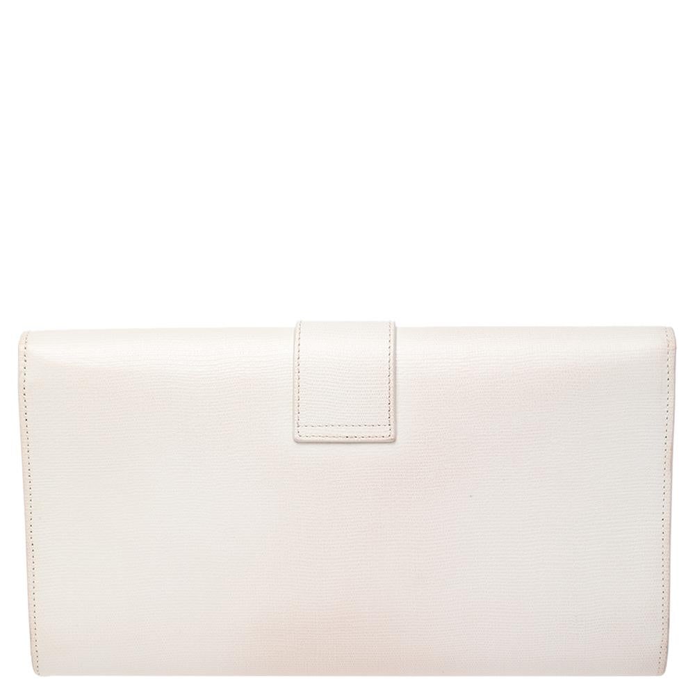 The Y-Ligne clutch by Saint Laurent is a creation that is not only stylish but also exceptionally well-made. It is a design that is simple and sophisticated, just right for the woman who embodies class in a modern way. Meticulously crafted from
