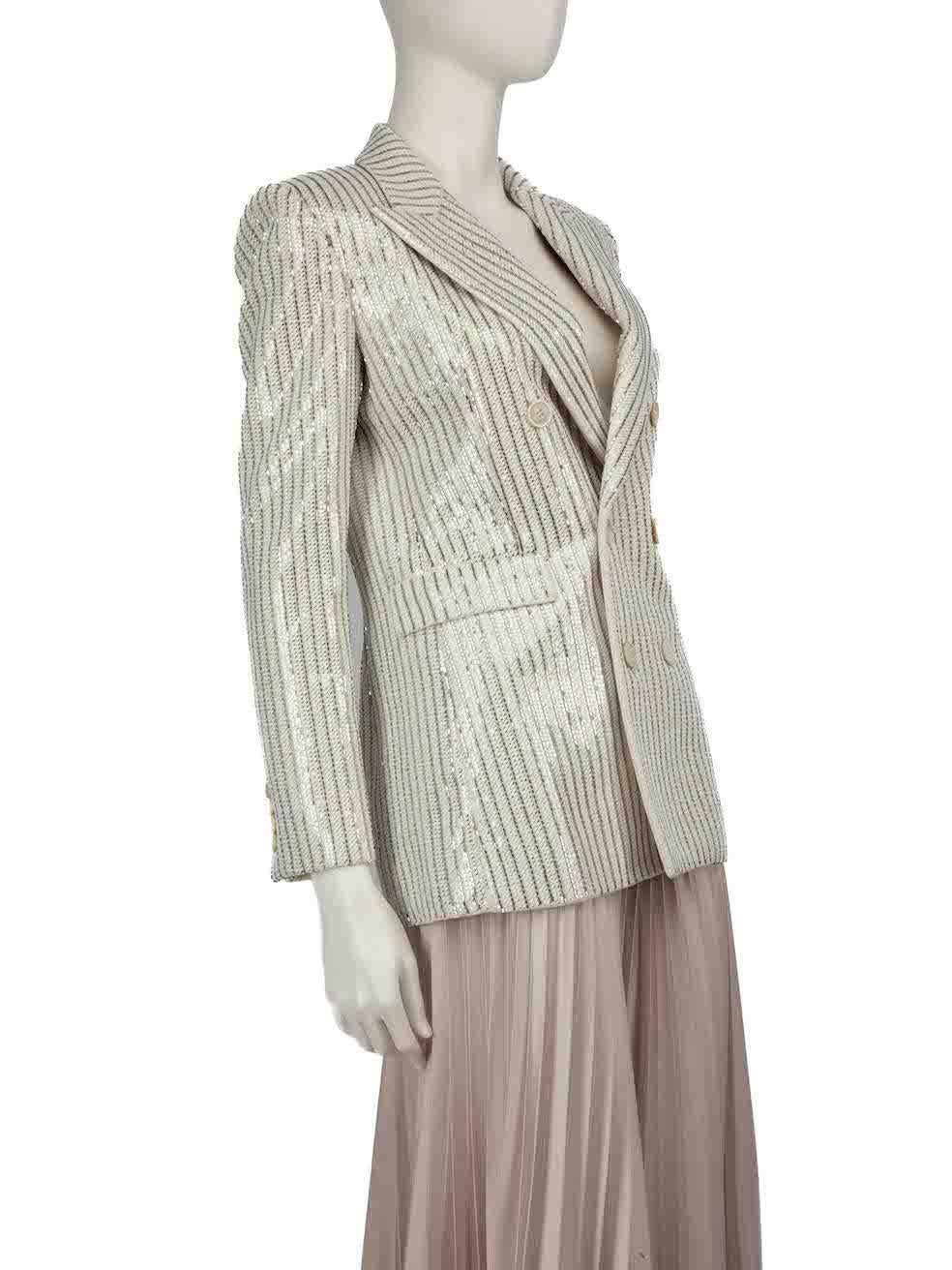CONDITION is Very good. Hardly any visible wear to the jacket is evident on this used Saint Laurent designer resale item.
 
 
 
 Details
 
 
 White
 
 Wool
 
 Blazer
 
 Silver beaded striped pattern
 
 Shoulder pads
 
 Double breasted
 
 Button up