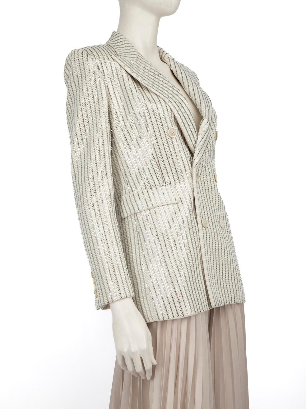 CONDITION is Very good. Minimal wear to the jacket is evident. Discolouration under the left sleeve on the lining and on both lapels on this used Saint Laurent designer resale item. Discolouration may need gentle hand wash contrary to dry clean