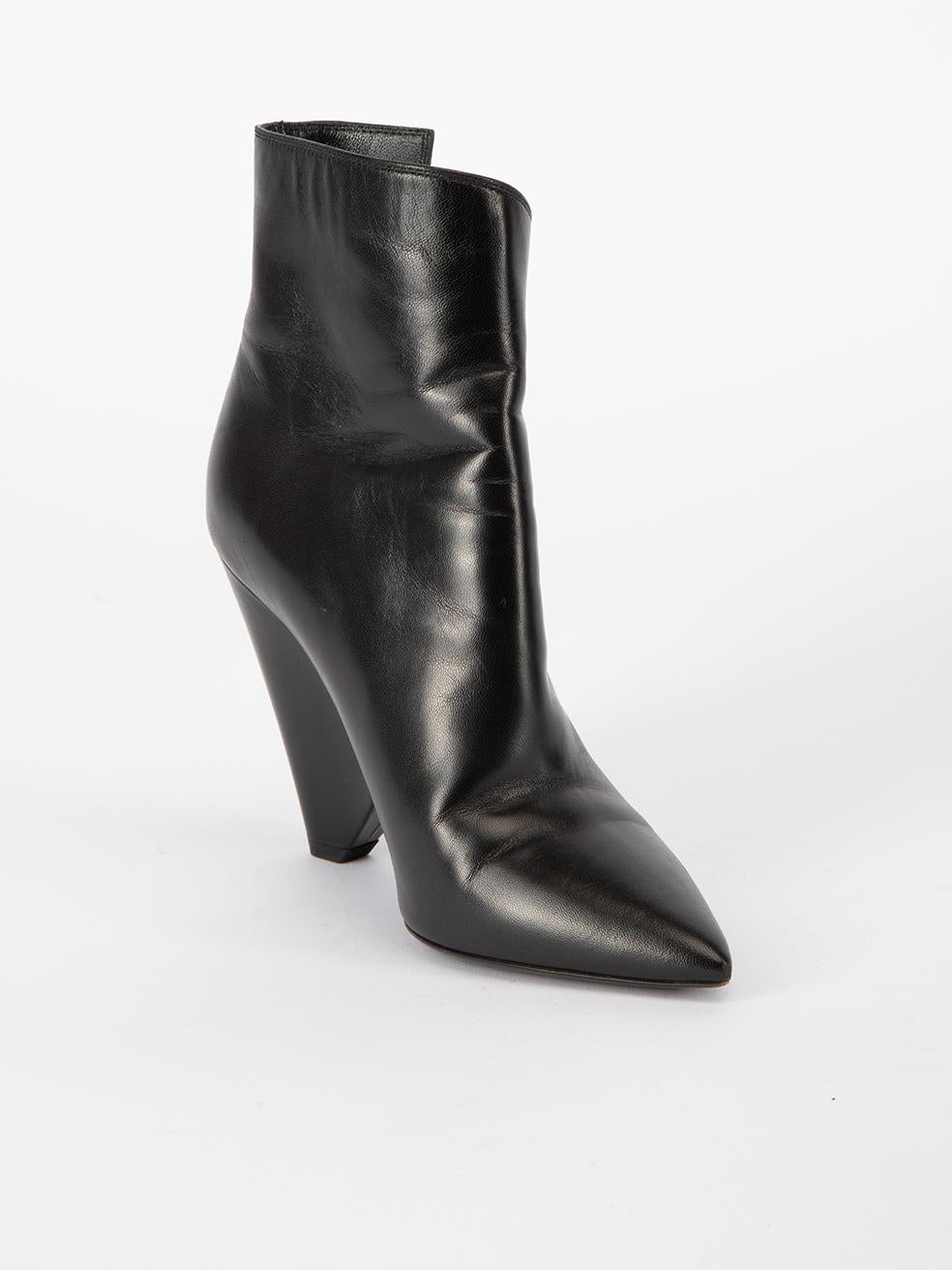 CONDITION is Very good. Minimal wear to shoes is evident. Minimal creasing to leather exterior material and light wear to toe points on this used Saint Laurent designer resale item.   Details  Black Leather Ankle boots Pointed toe High wedge heel