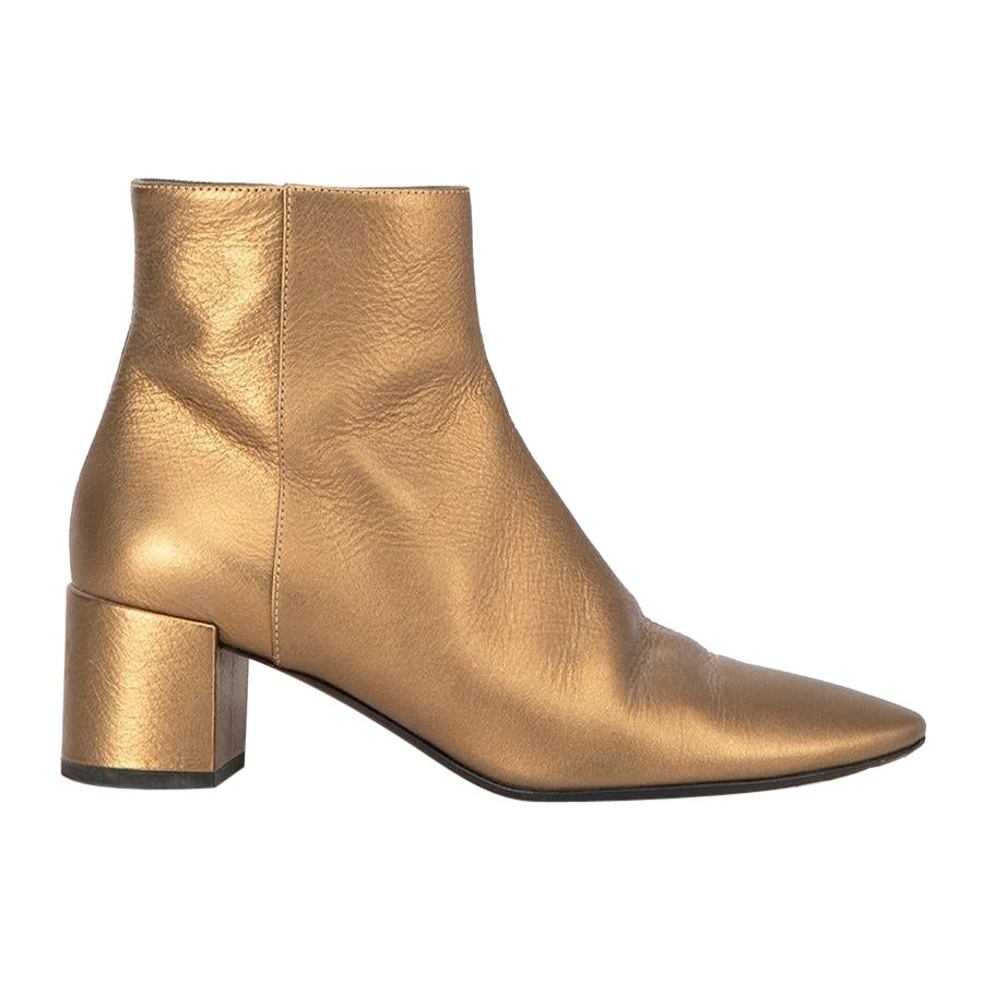Saint Laurent Women
s Gold Leather Pointed Toe Metallic Ankle Boots