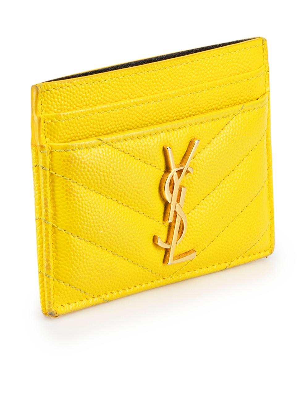 CONDITION is Good. Minor wear to card holder is evident. Light wear to the stitching with discolouration to the thread and minor scuffs to the corners, rear and rear card slot trim on this used Saint Laurent designer resale item. This item comes