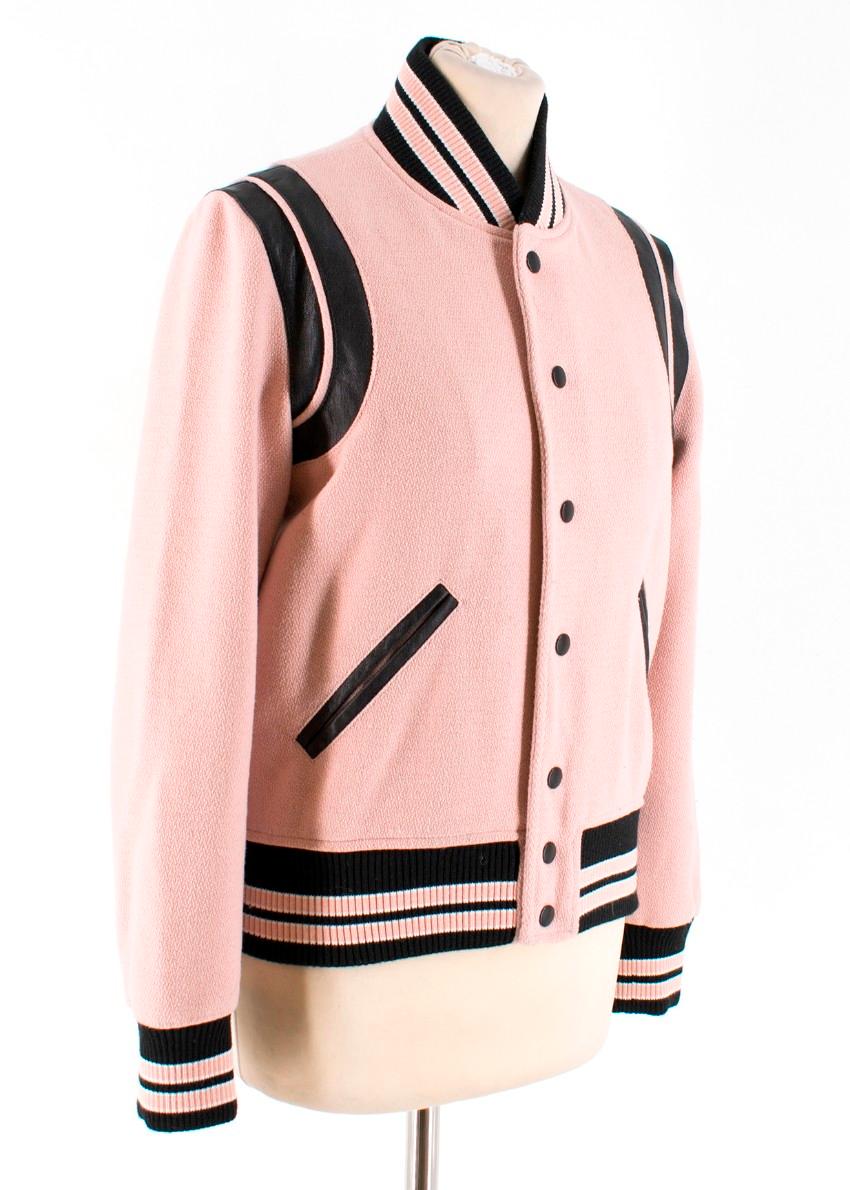 Saint Laurent Wool-blend Teddy Jacket

- Classic varsity style jacket
- Baby pink wool blend
- Striped cuffs, collar and hem
- Leather trim around the shoulders and pocket opening
- Snap front closure
- Front slash pockets
- Lined
- Two interior