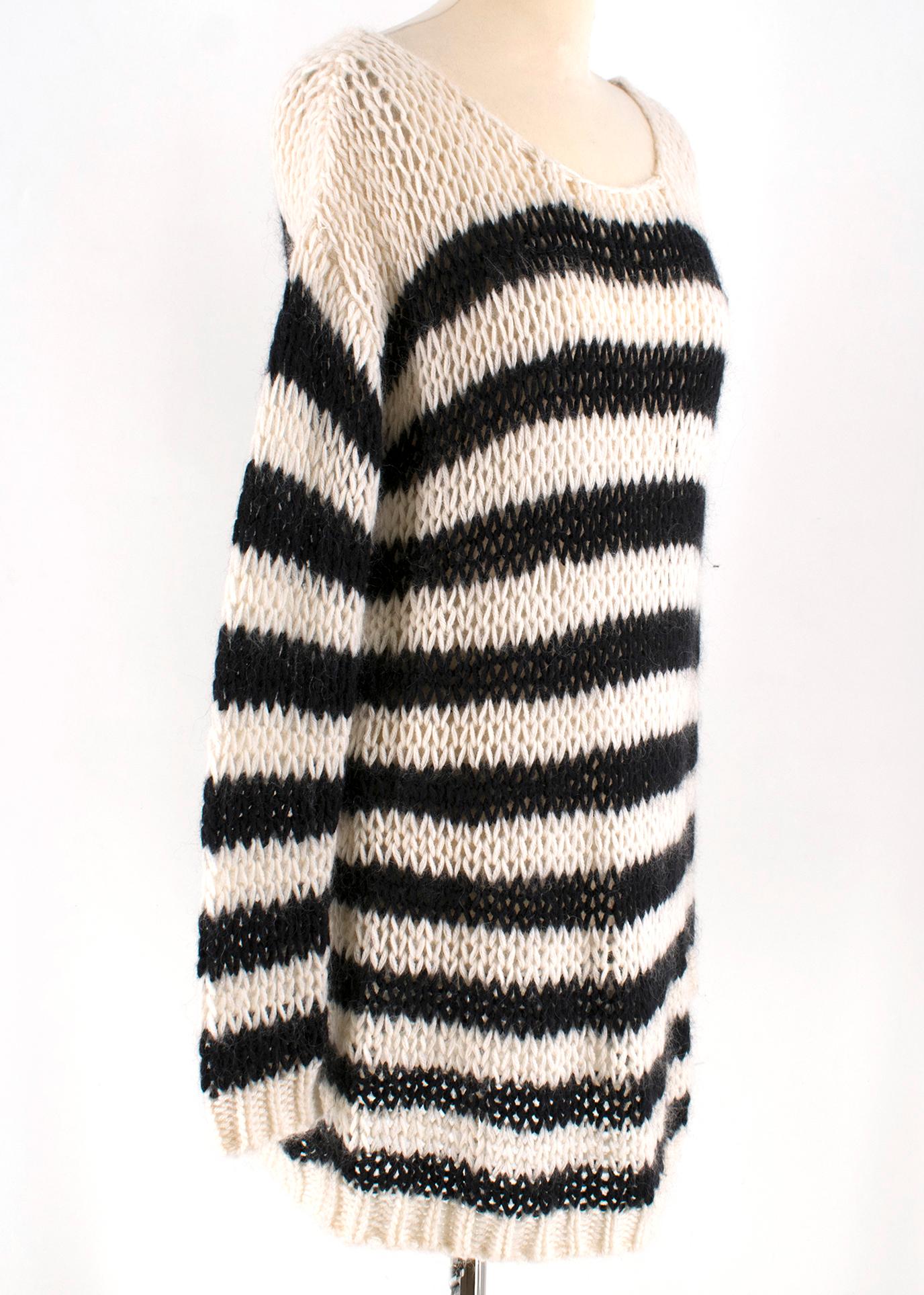 Saint Laurent Wool Oversize Striped Sweater

Round neck
Oversize fit
open knit 

Please note, these items are pre-owned and may show some signs of storage, even when unworn and unused. This is reflected within the significantly reduced price. Please