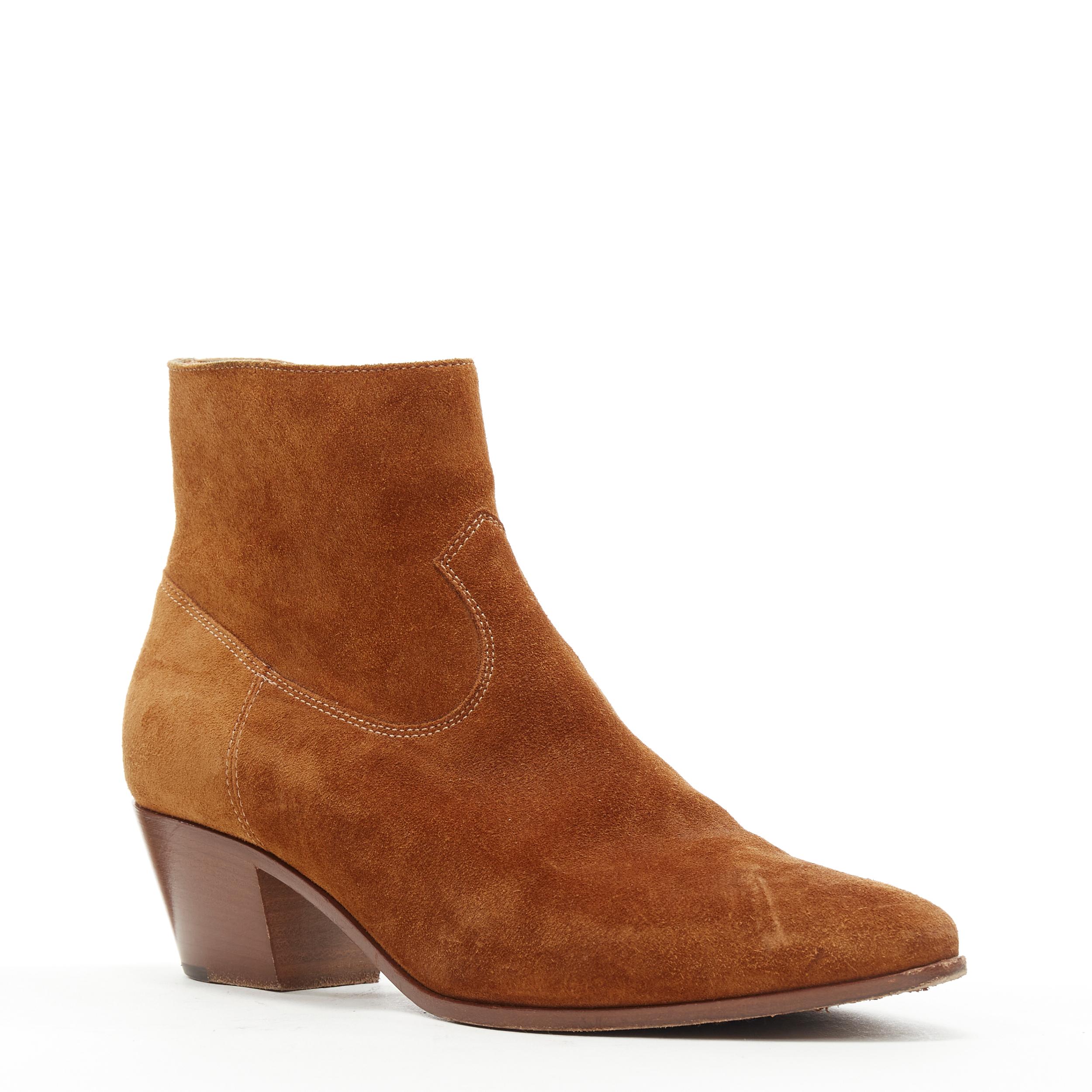 SAINT LAURENT Wyatt tan brown suede almond toe cuban bootie EU38 
Reference: LNKO/A01777 
Brand: Saint Laurent 
Material: Suede 
Color: Brown 
Pattern: Solid 
Closure: Zip 
Extra Detail: Almond point toe. Wooden cuban heel. 
Made in: Italy