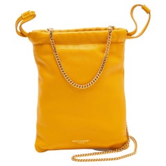 Saint Laurent Yellow Leather Drawstring Pouch On Chain